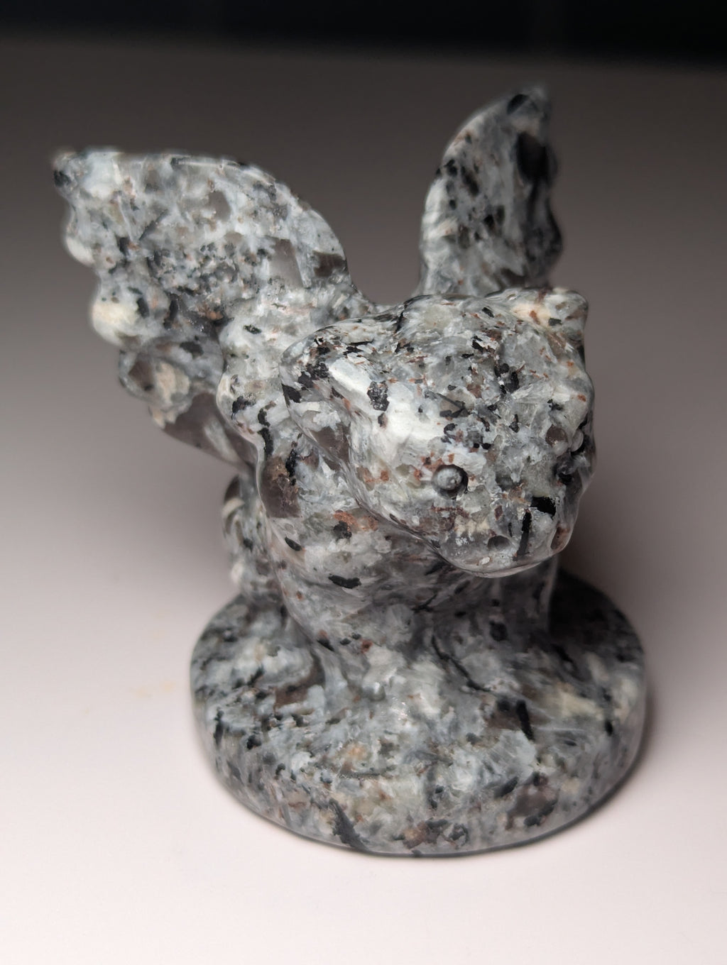 Yooperlite crystal Gargoyle carving orange UV