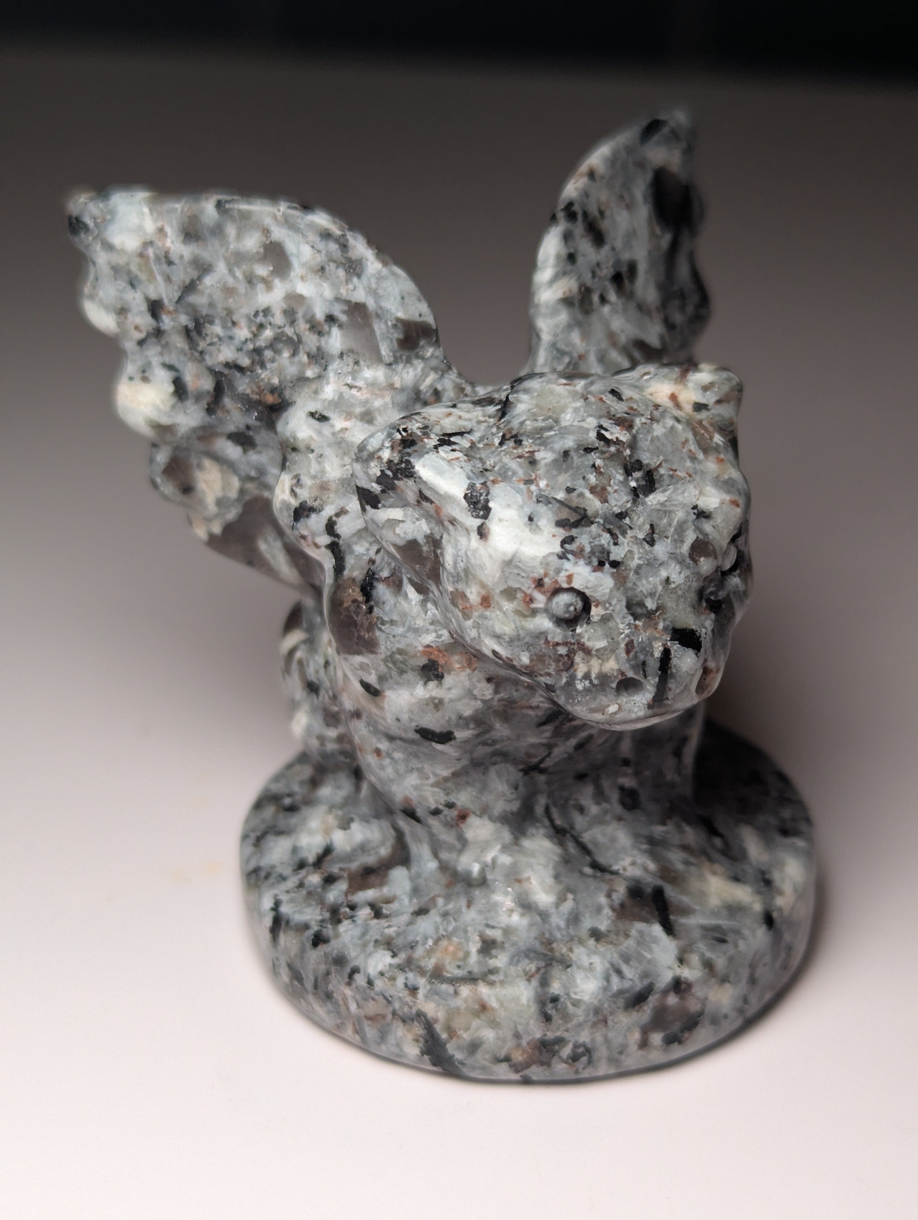 Yooperlite crystal Gargoyle carving orange UV