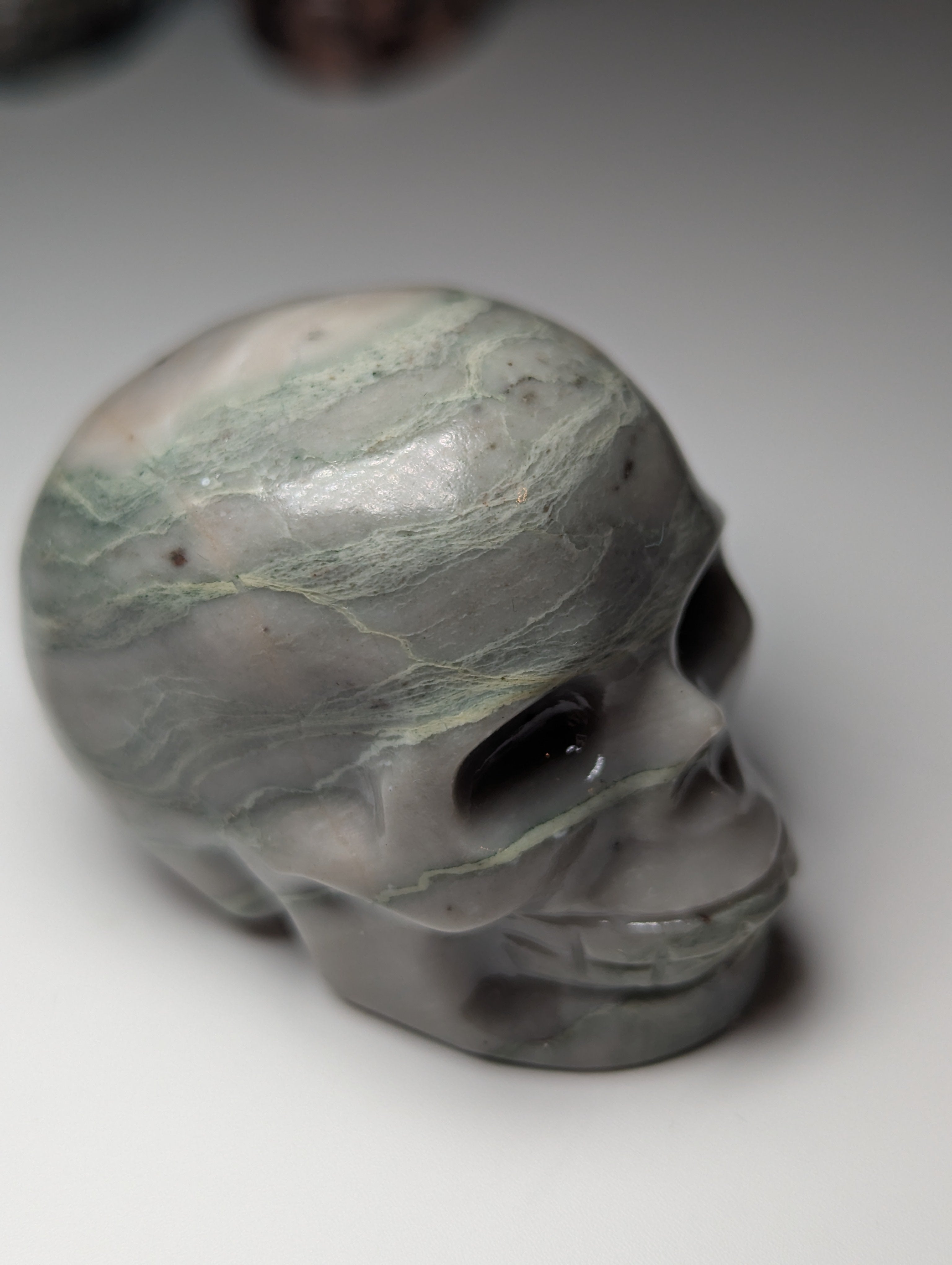 Green vain Jasper crystal skull