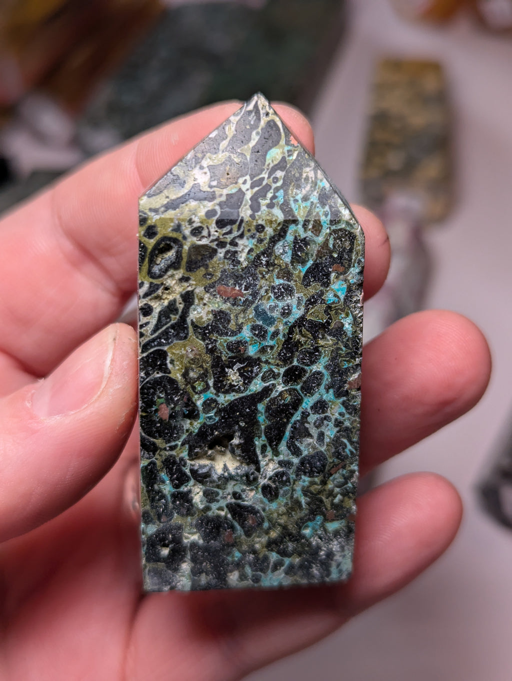 Epidote crystal with copper tower