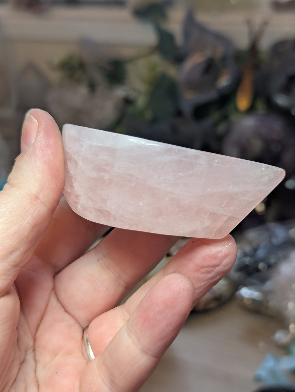 Rose quartz crystal dish with imperfections