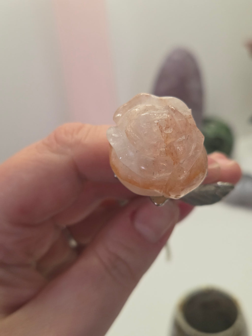 Fire quartz crystal rose carving on a stem