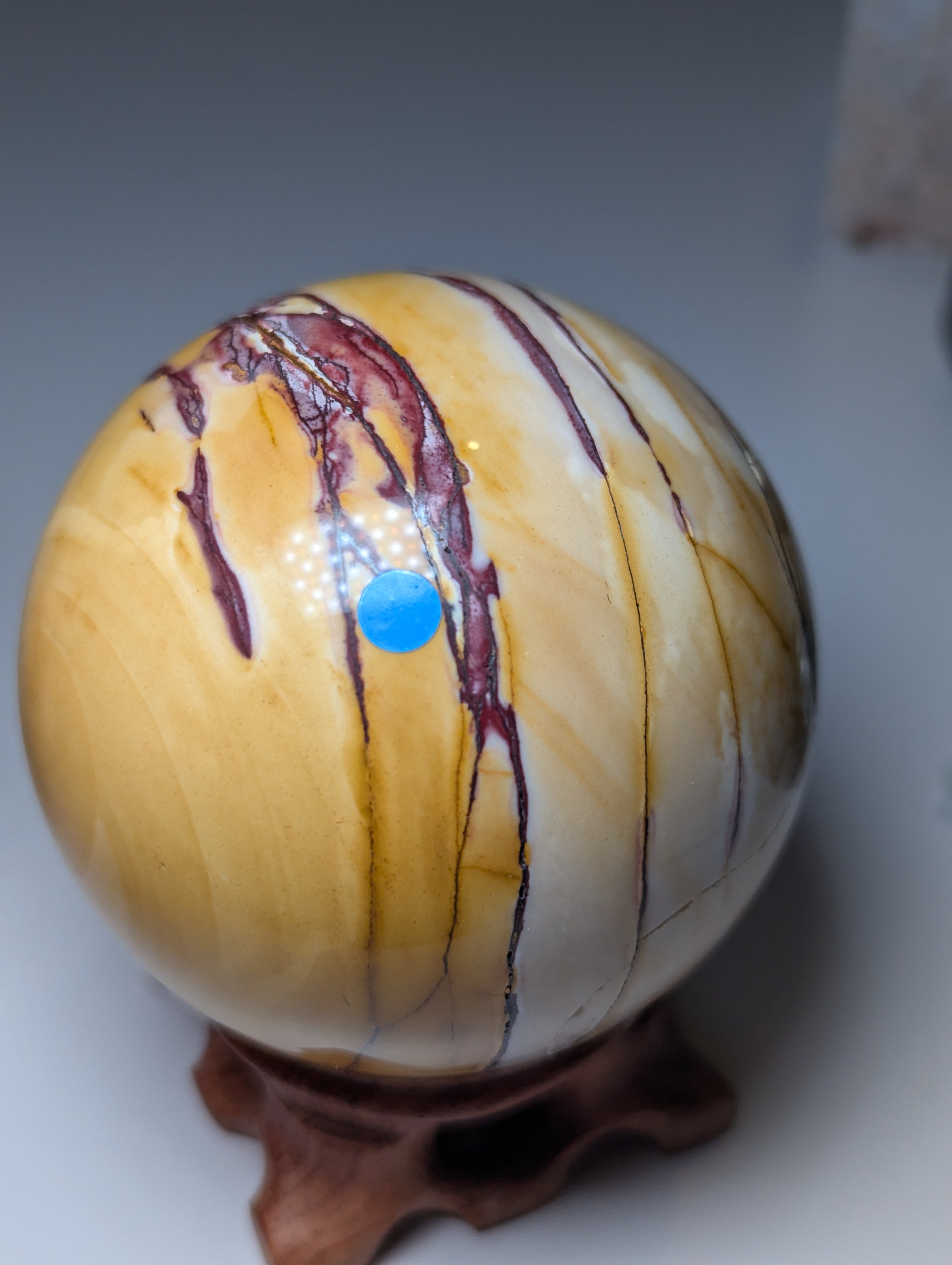 Mookaite crystal sphere with stand