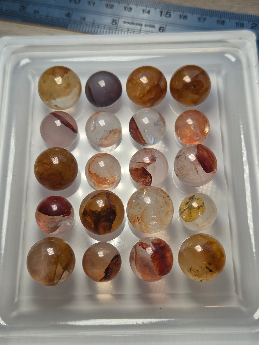 Mini crystal sphere fire quartz and golden healer- with stand
