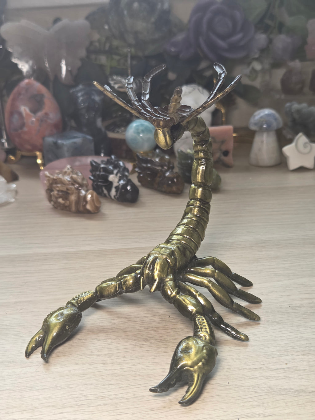 Golden scorpion sphere stand