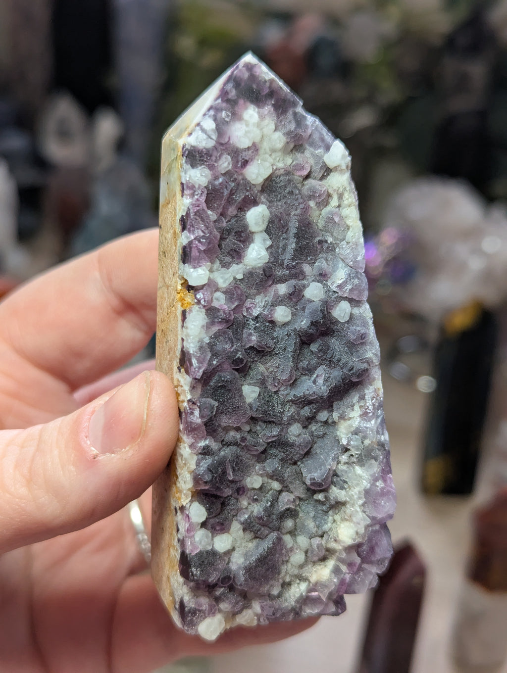 Raw flourite crystal tower carving