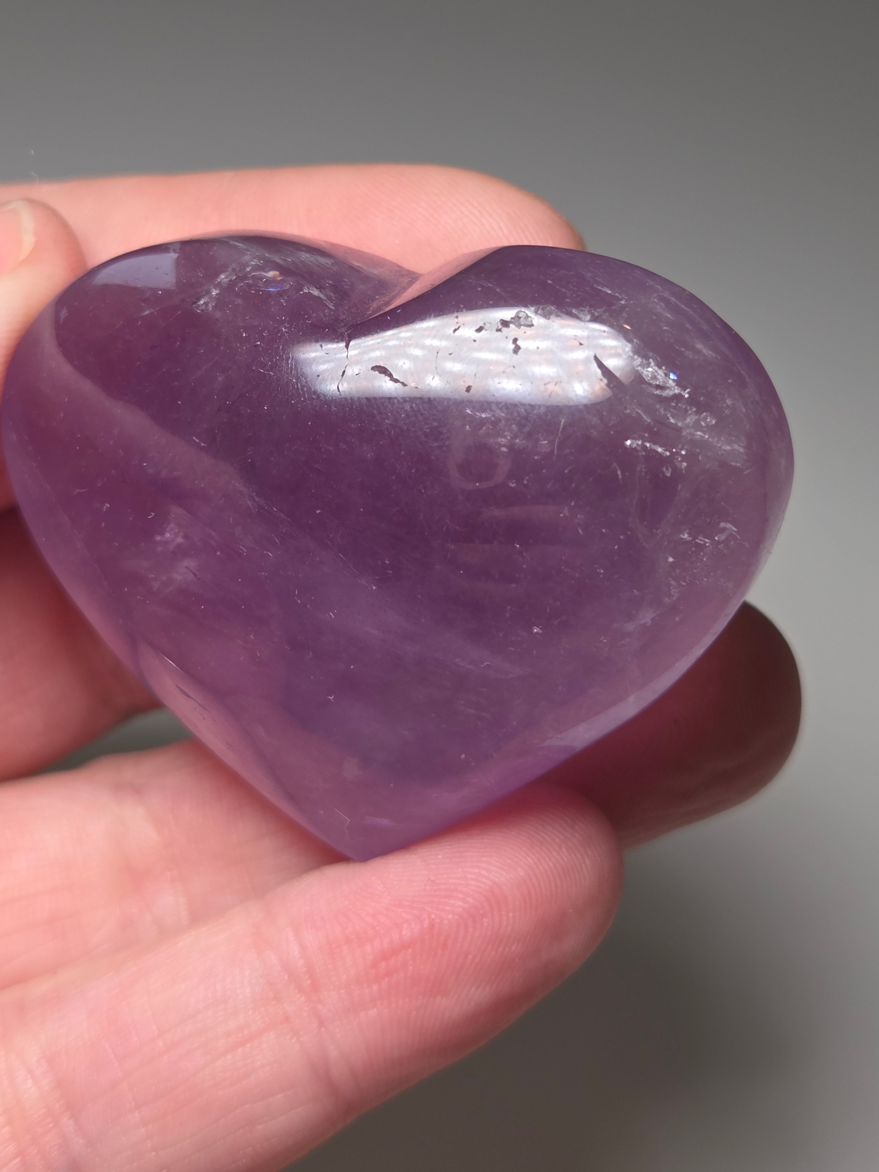 Amethyst crystal heart  carving with imperfections