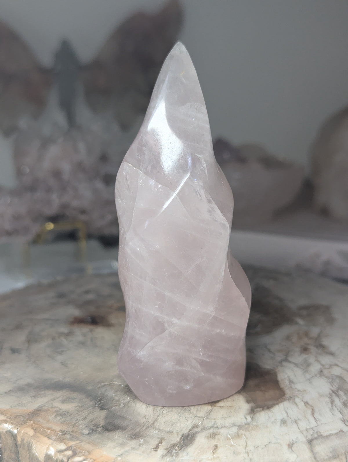 Rose quartz crystal flame carving