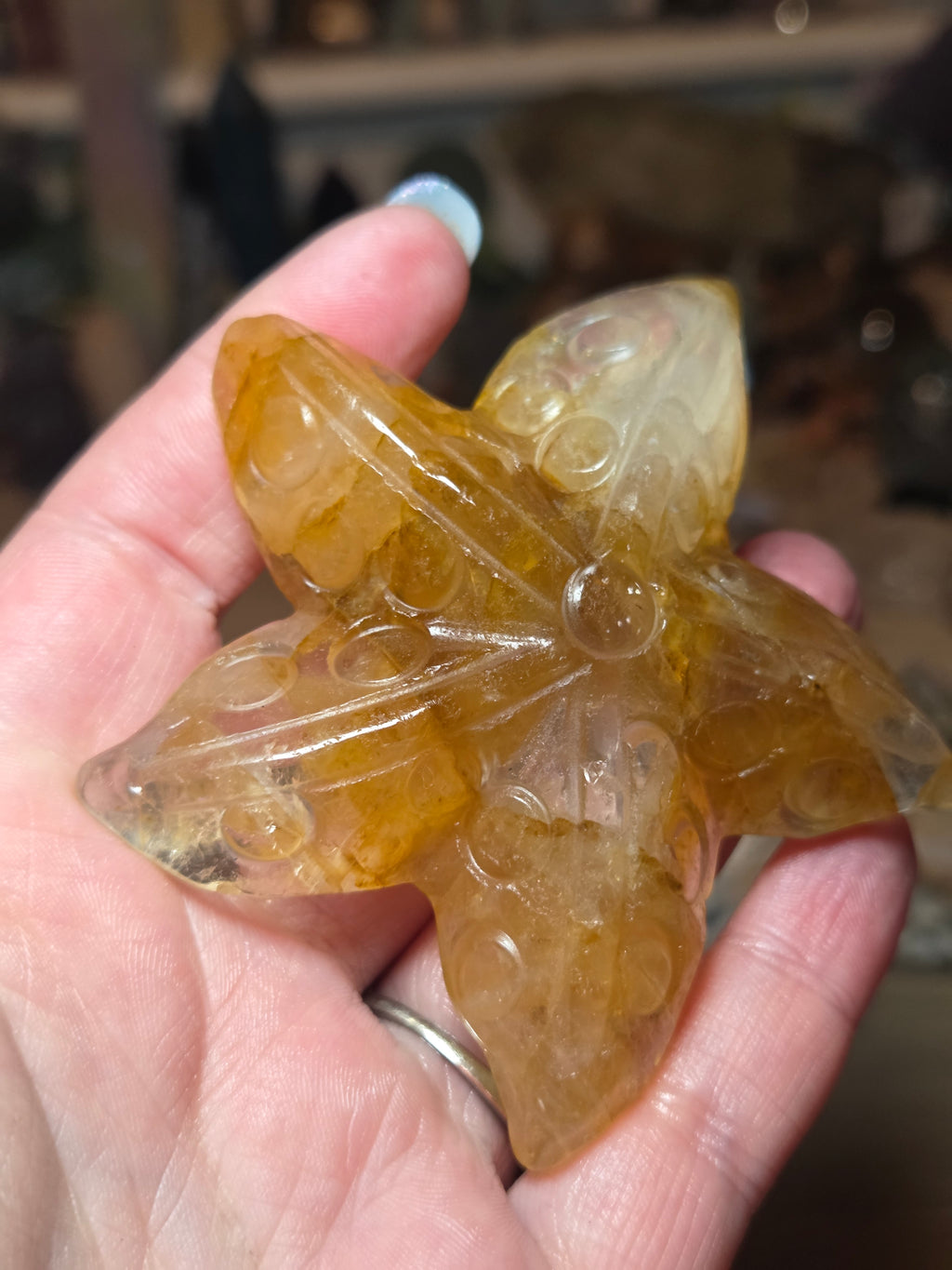Golden healer star fish carving