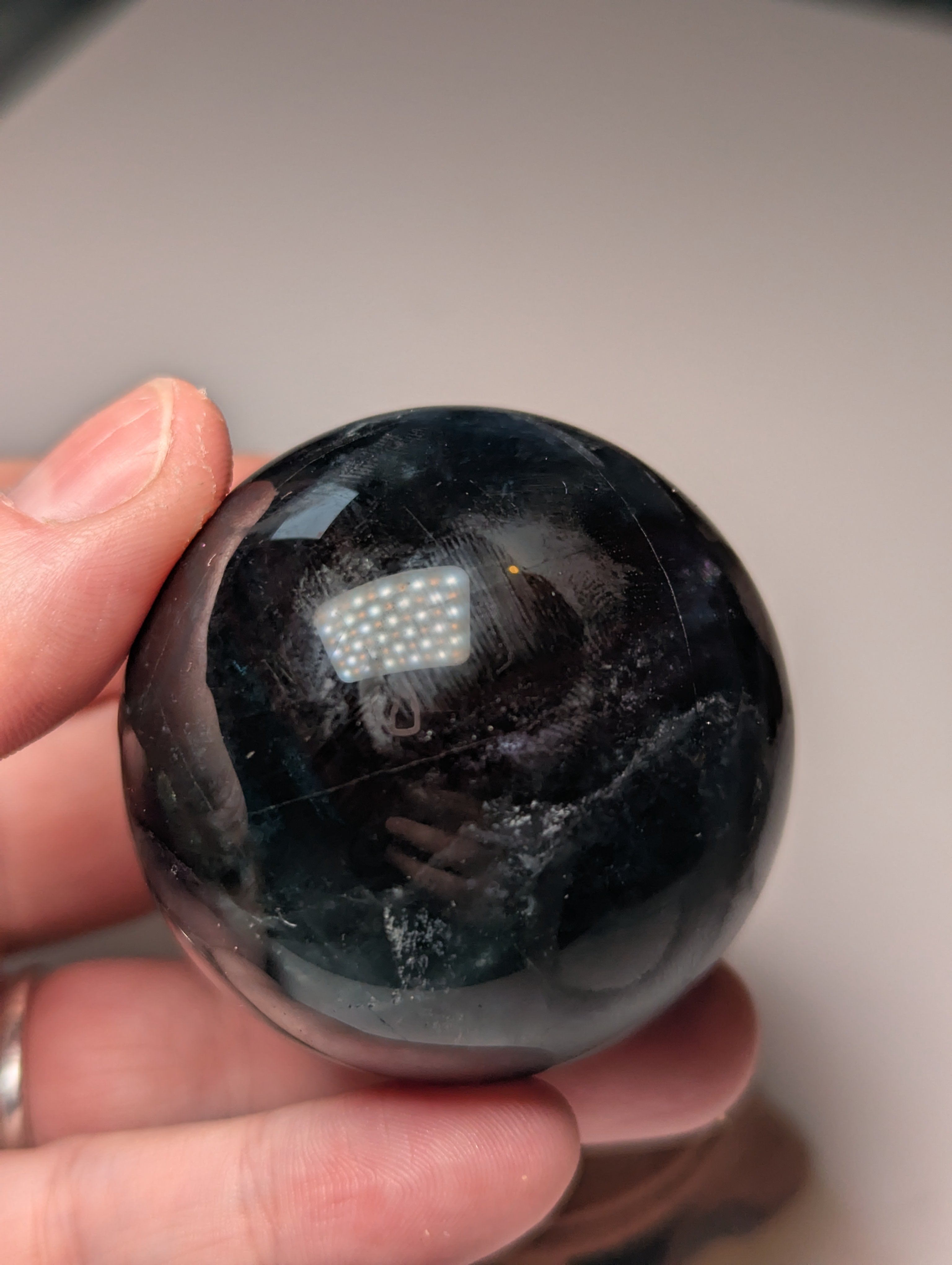 Black rose flourite crystal sphere with stand UV reactive