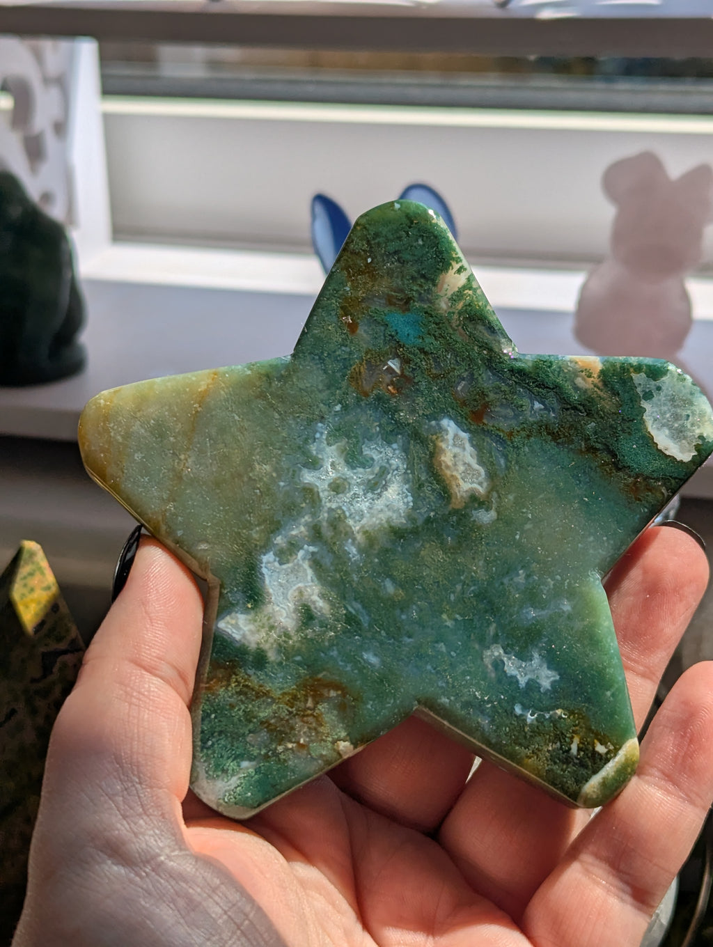 Moss agate crystal star with stand