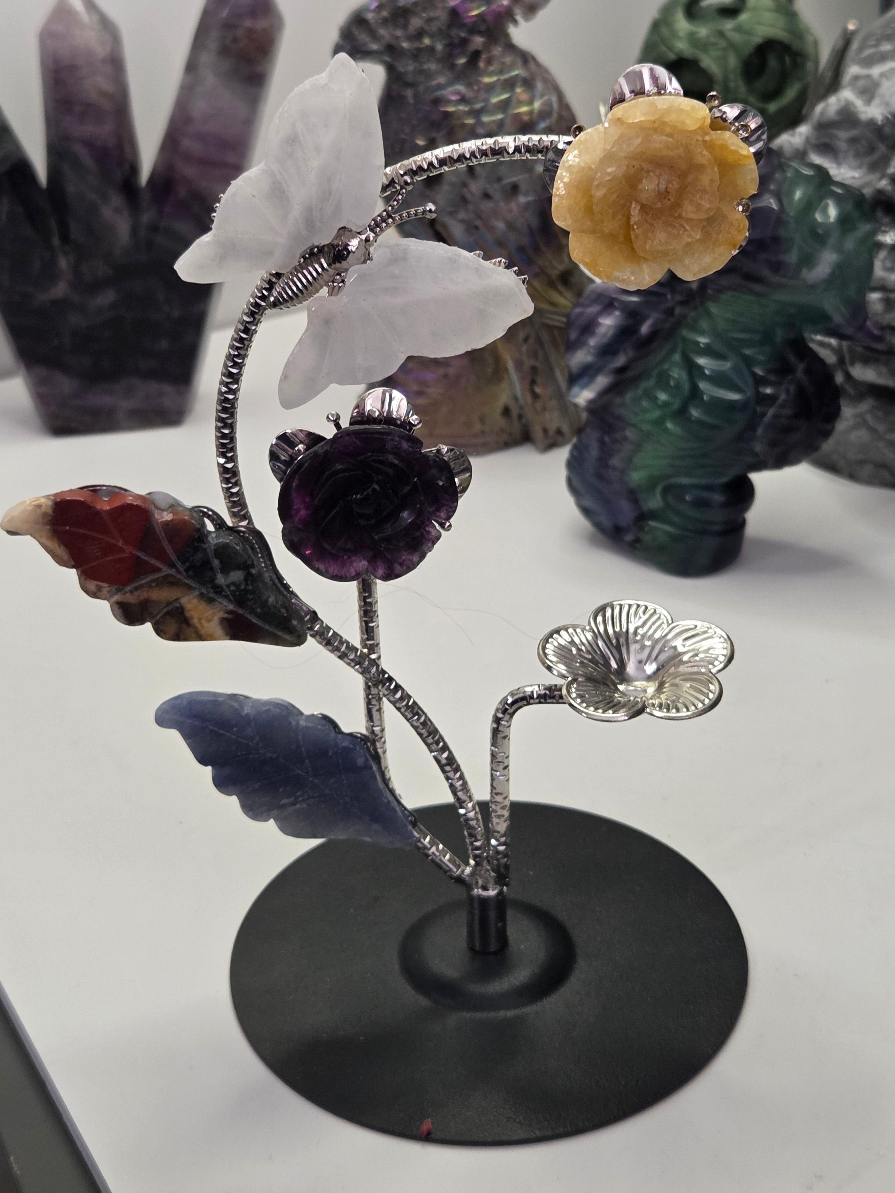 Flower and butterfly sphere stand