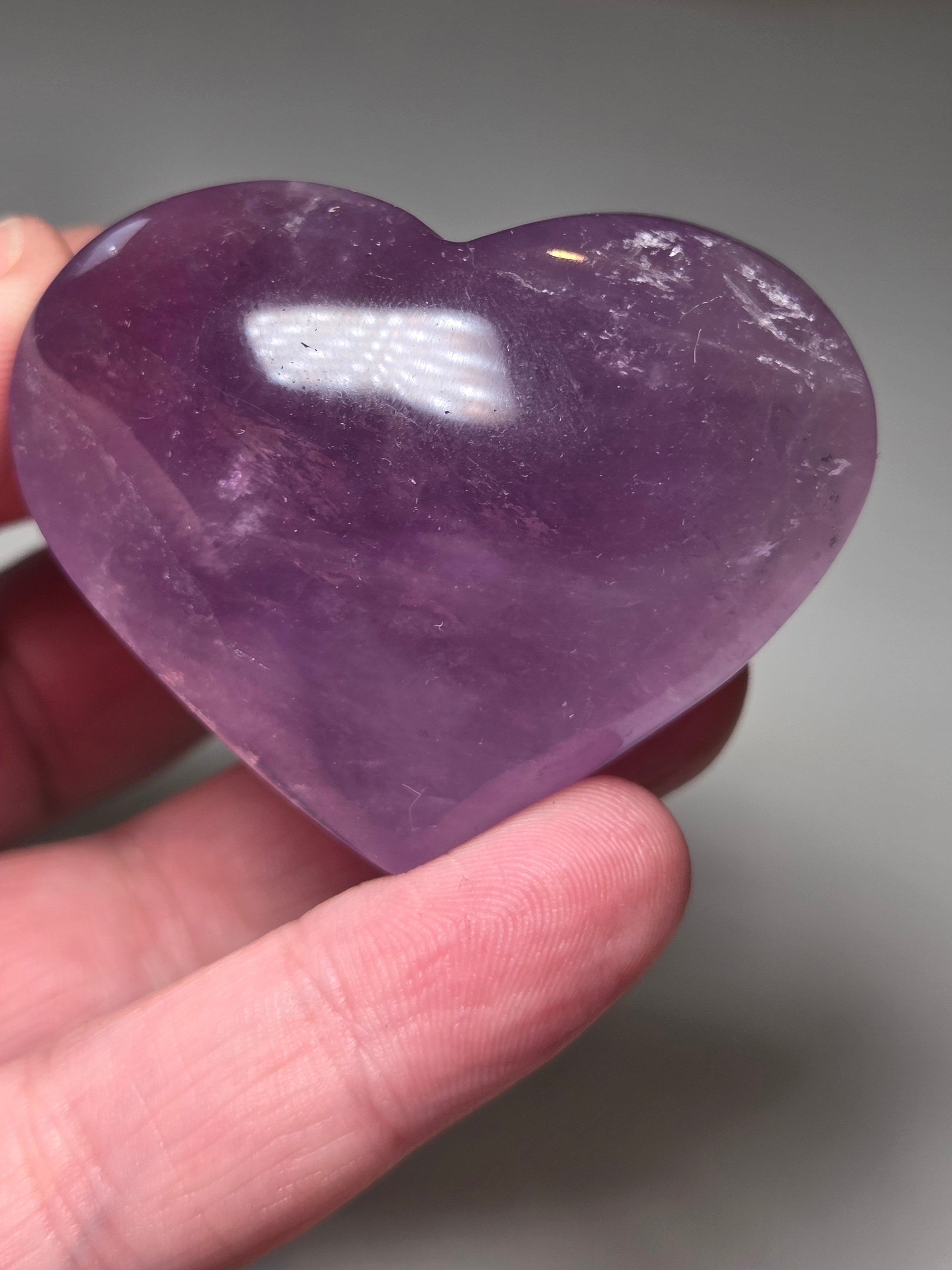 Amethyst crystal heart  carving with imperfections