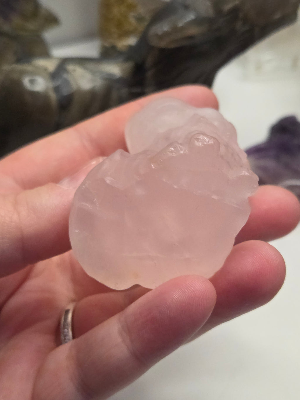 Rose quartz crystal cat carving