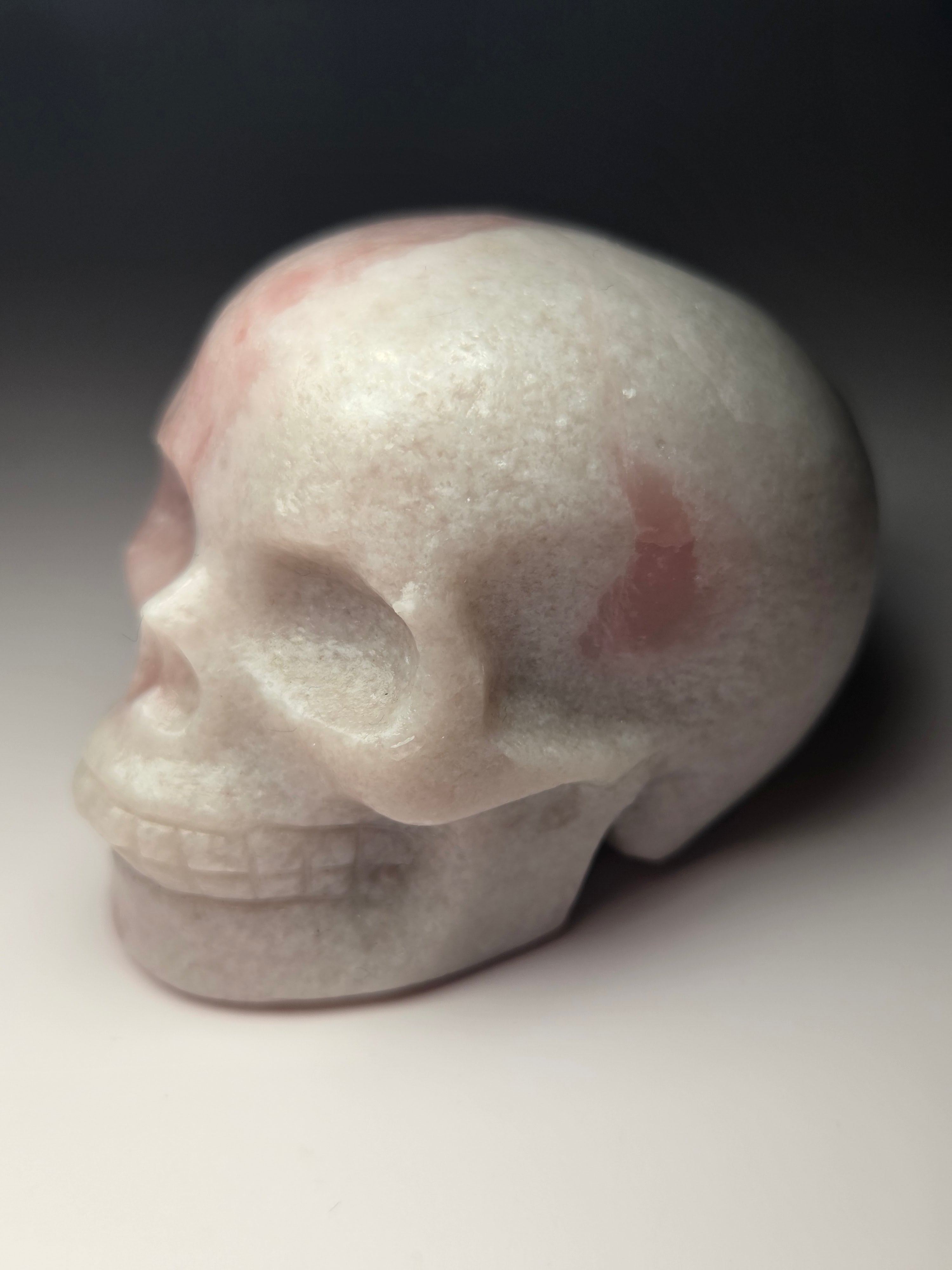Pink opal  crystal skull carving