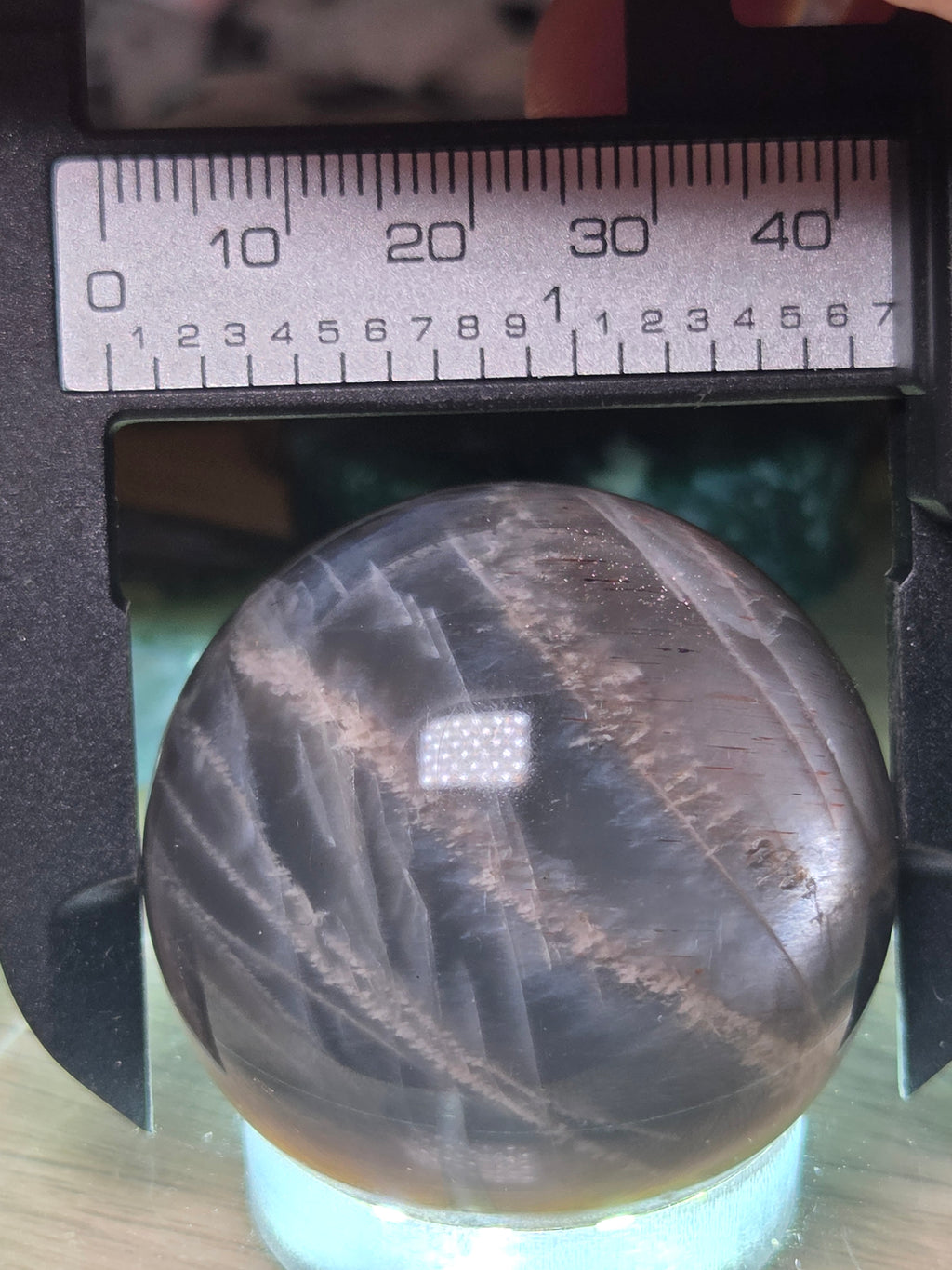 Black Moonstone and sunstone crystal sphere