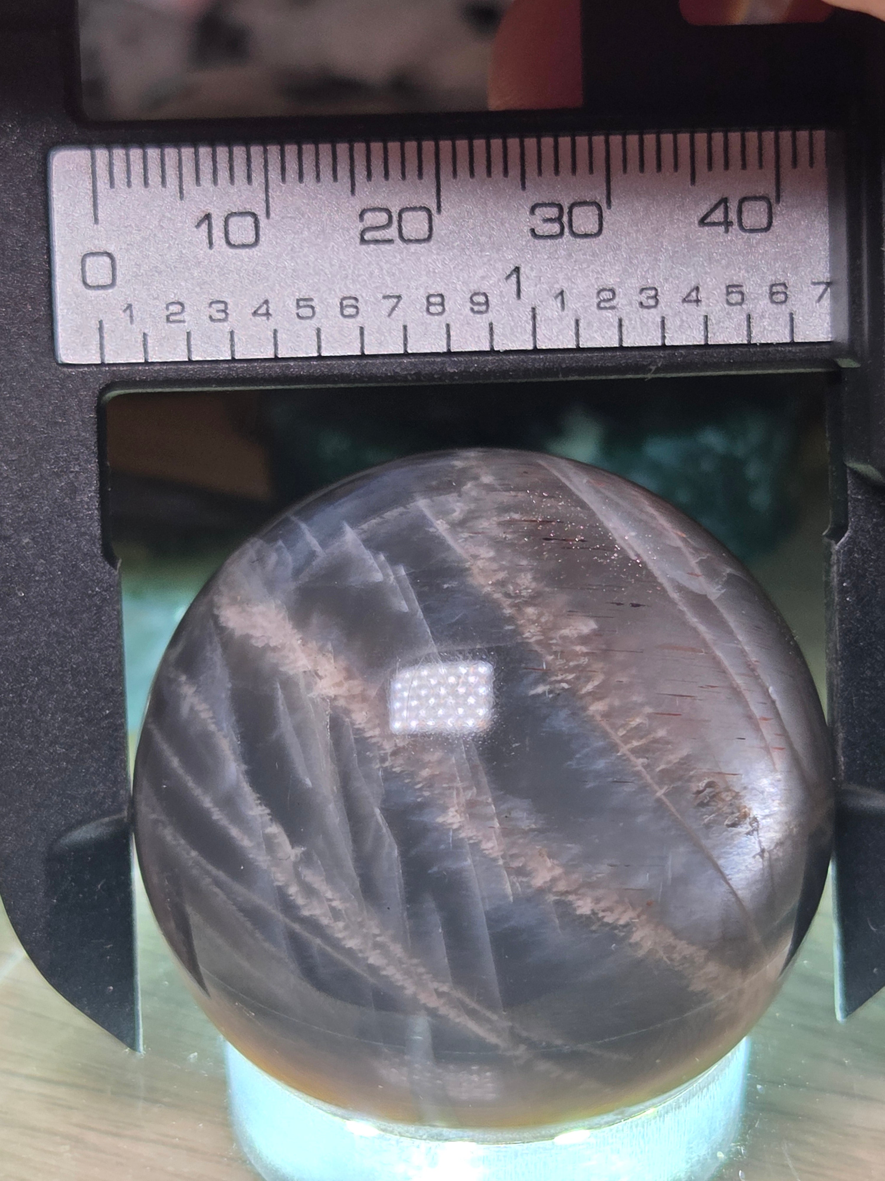 Black Moonstone and sunstone crystal sphere