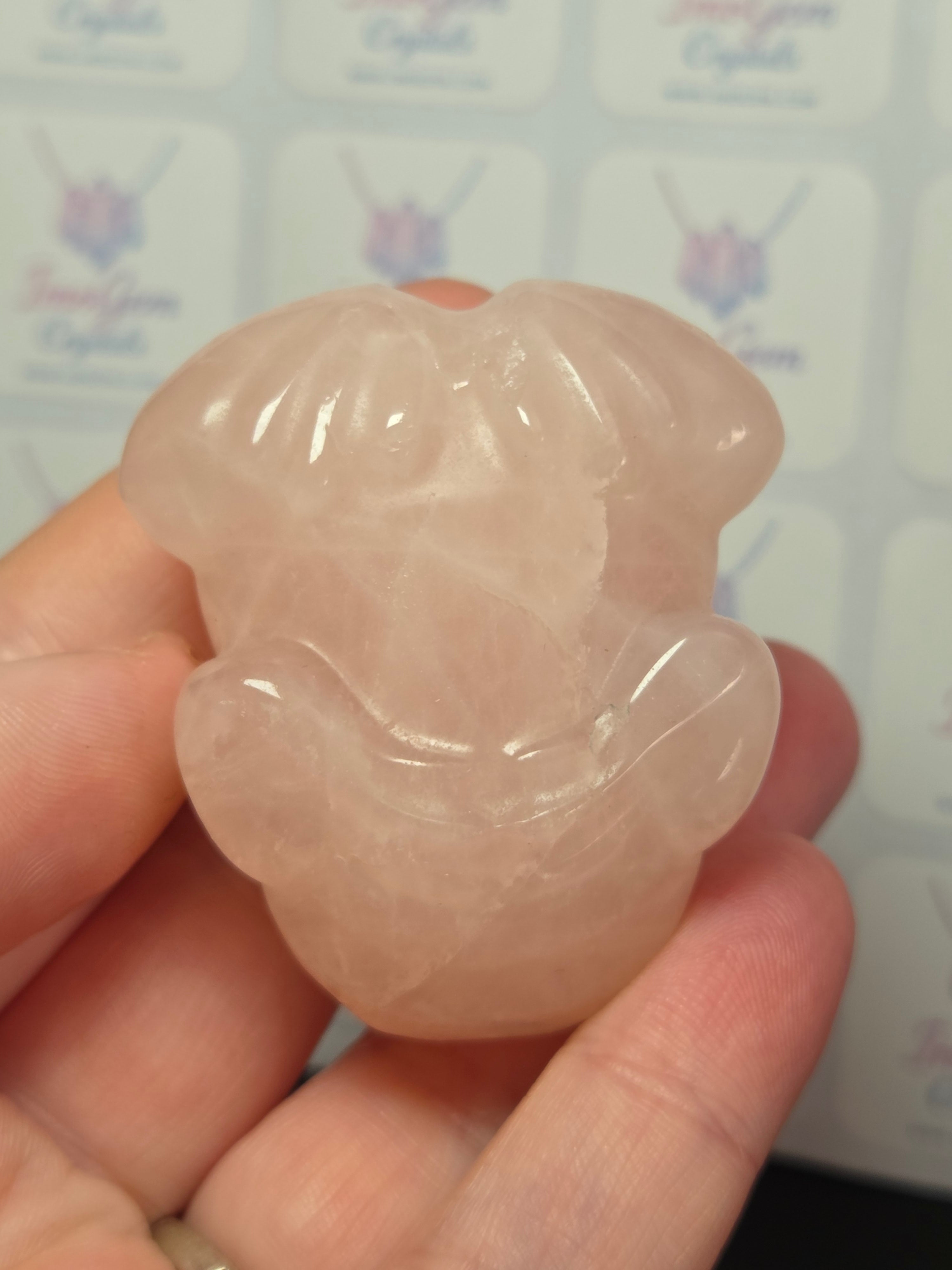 Rose quartz crystal frog carving