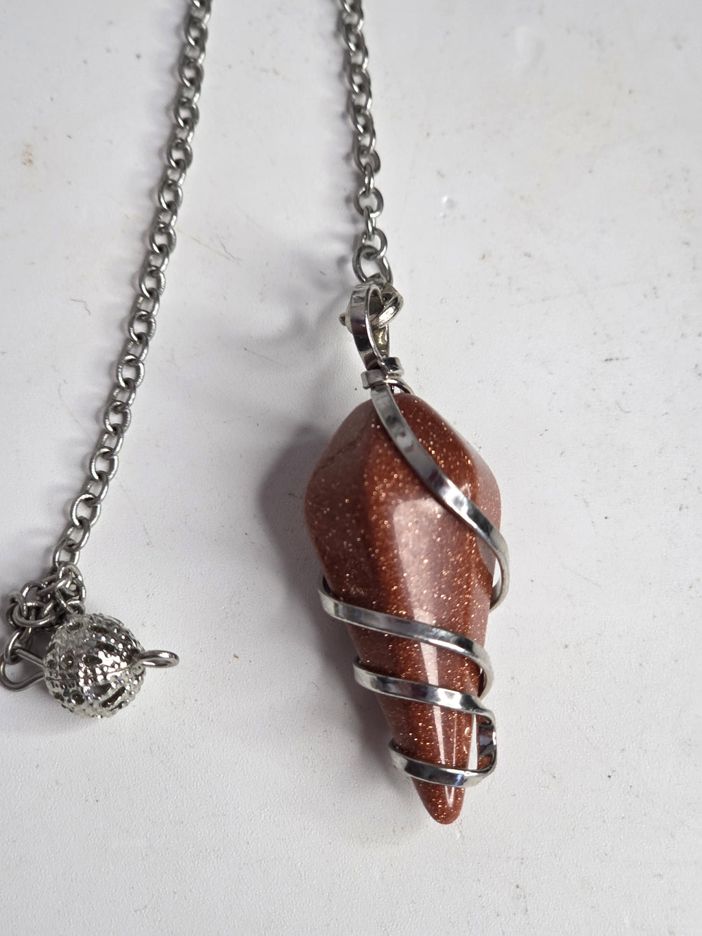 Golden Sandstone pendulum