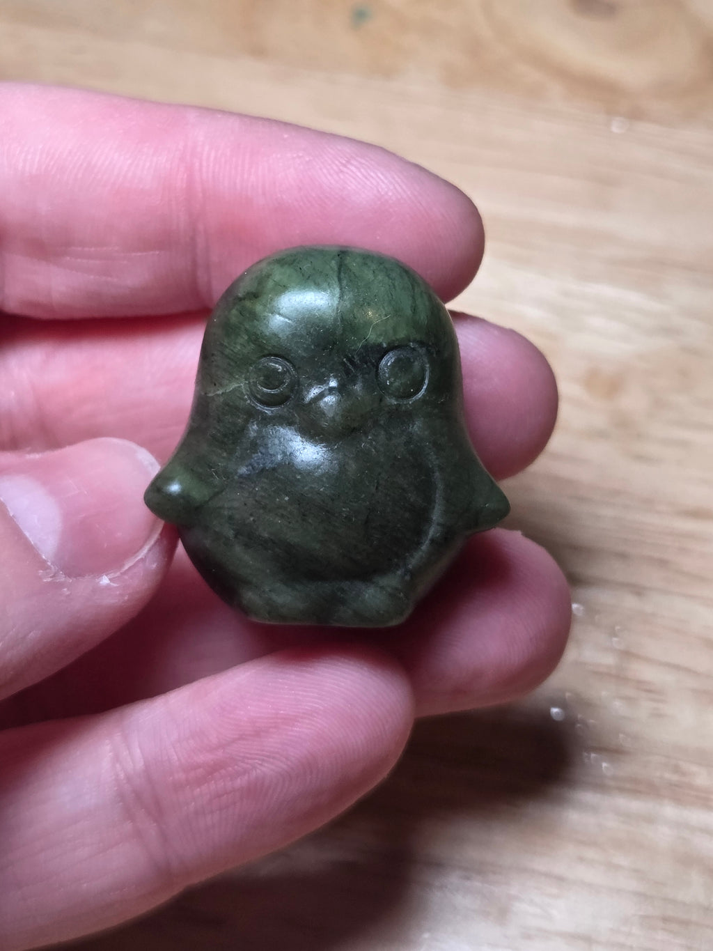 Green jade penguin carving