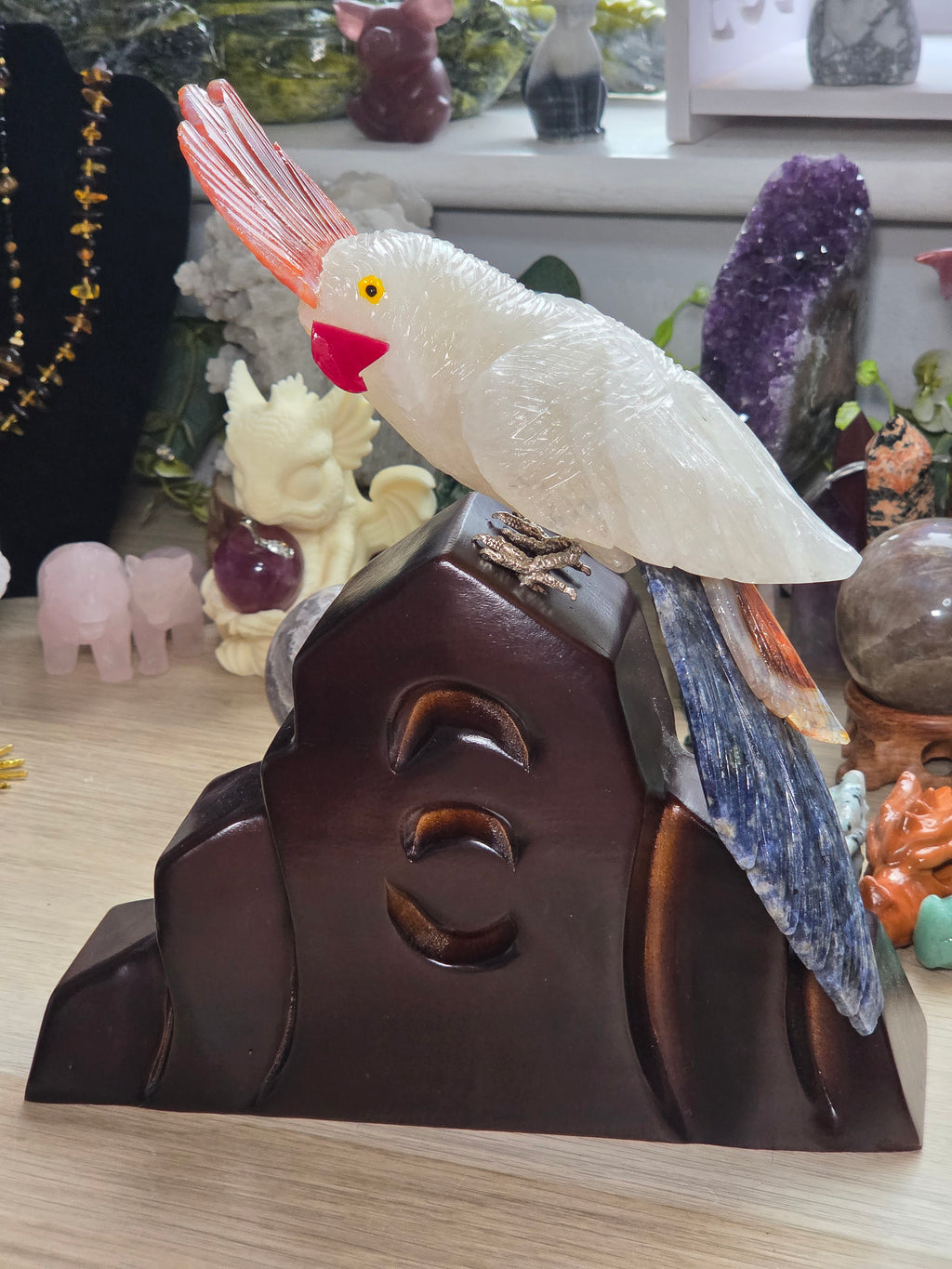 Amazing clear quartz crystal parrot with red agate and sodalite with custom stand