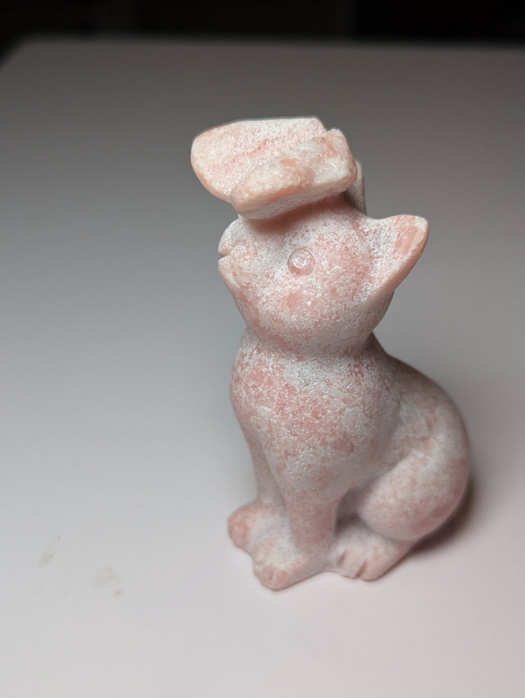 Pink opal cat with butterfly carving