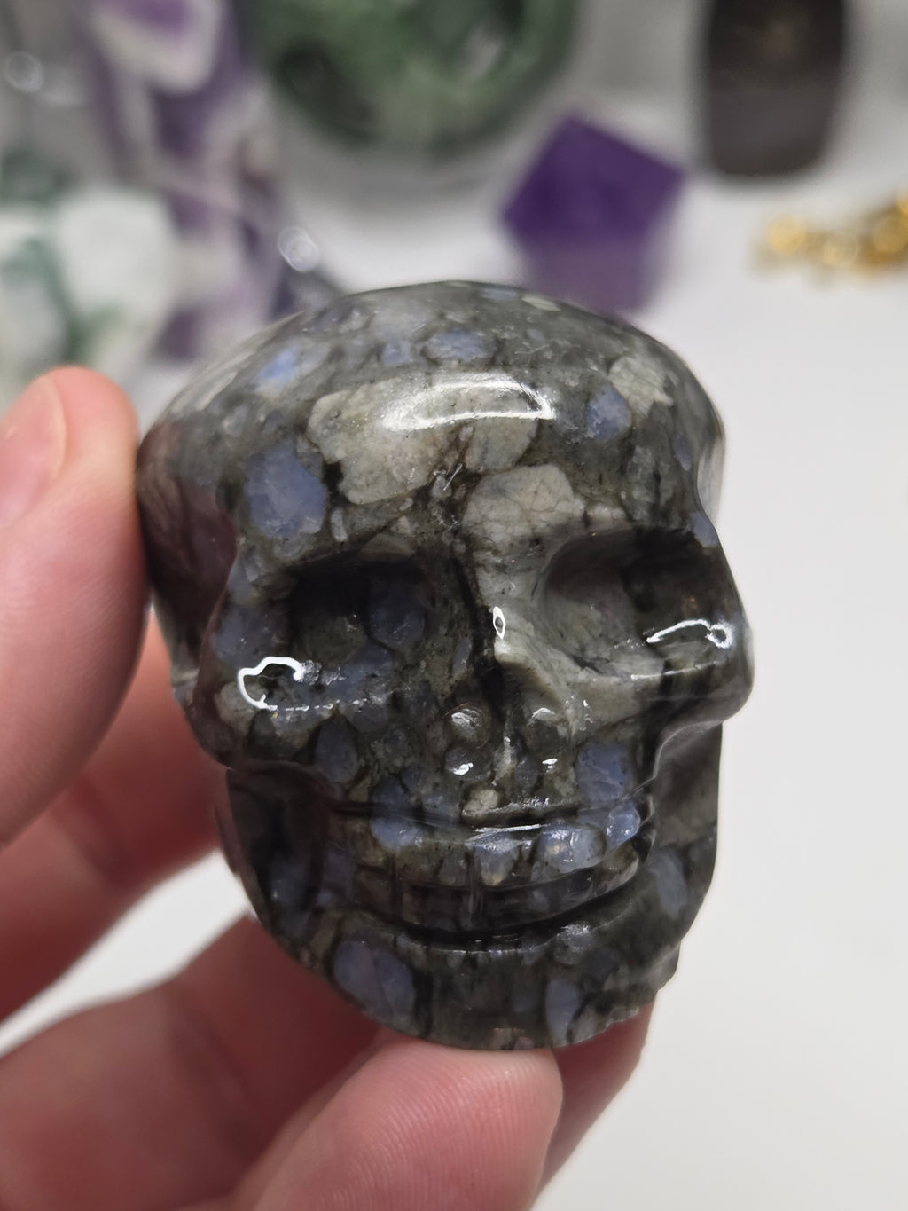 Blue spot crystal skull carving