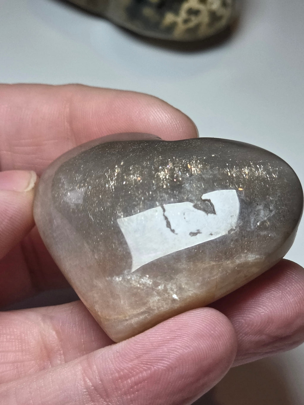 Sunstone and moonstone crystal heart carving with imperfections