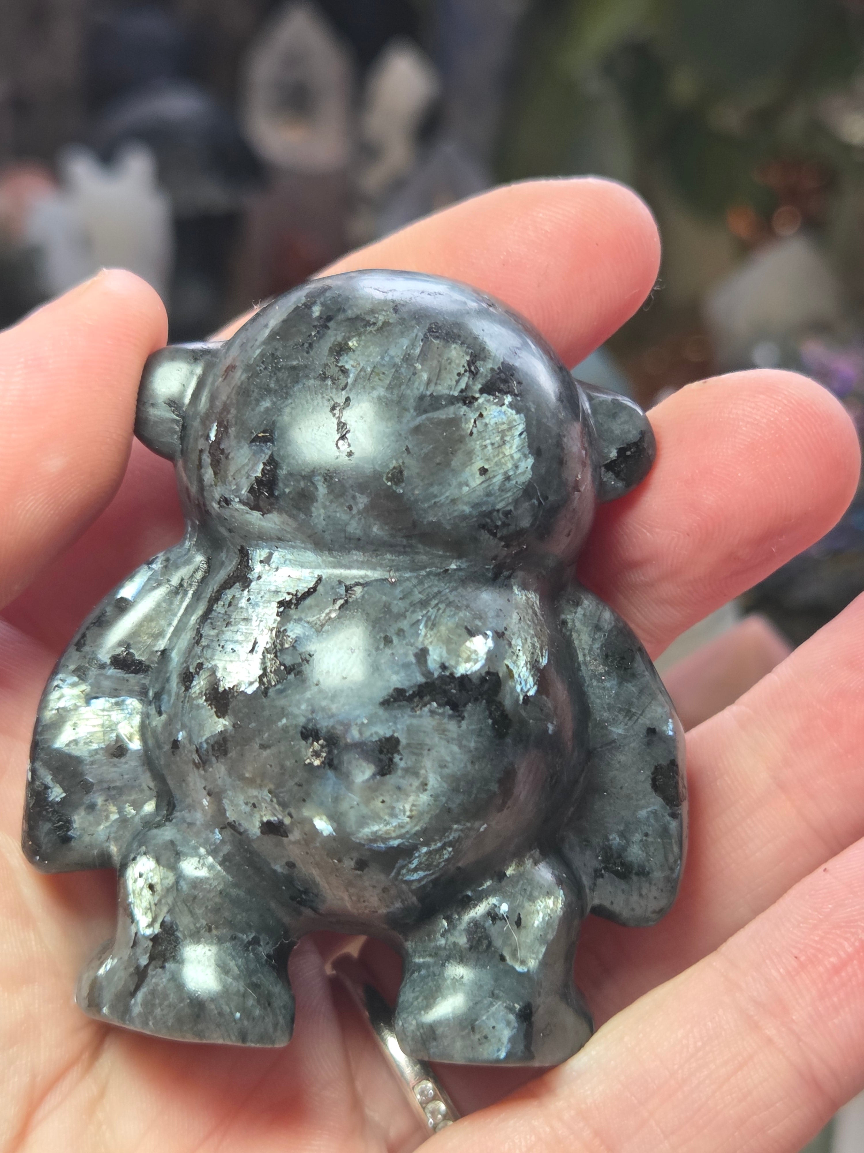 Larvakite crystal monkey carving