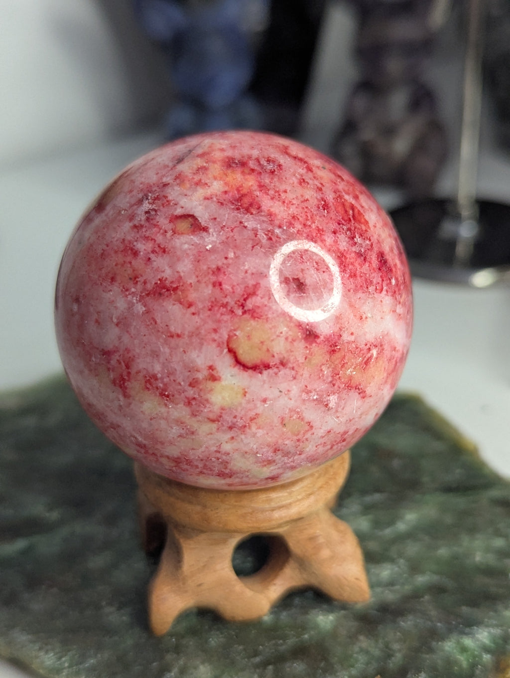 Pink Zoiltie crystal sphere with Orange UV