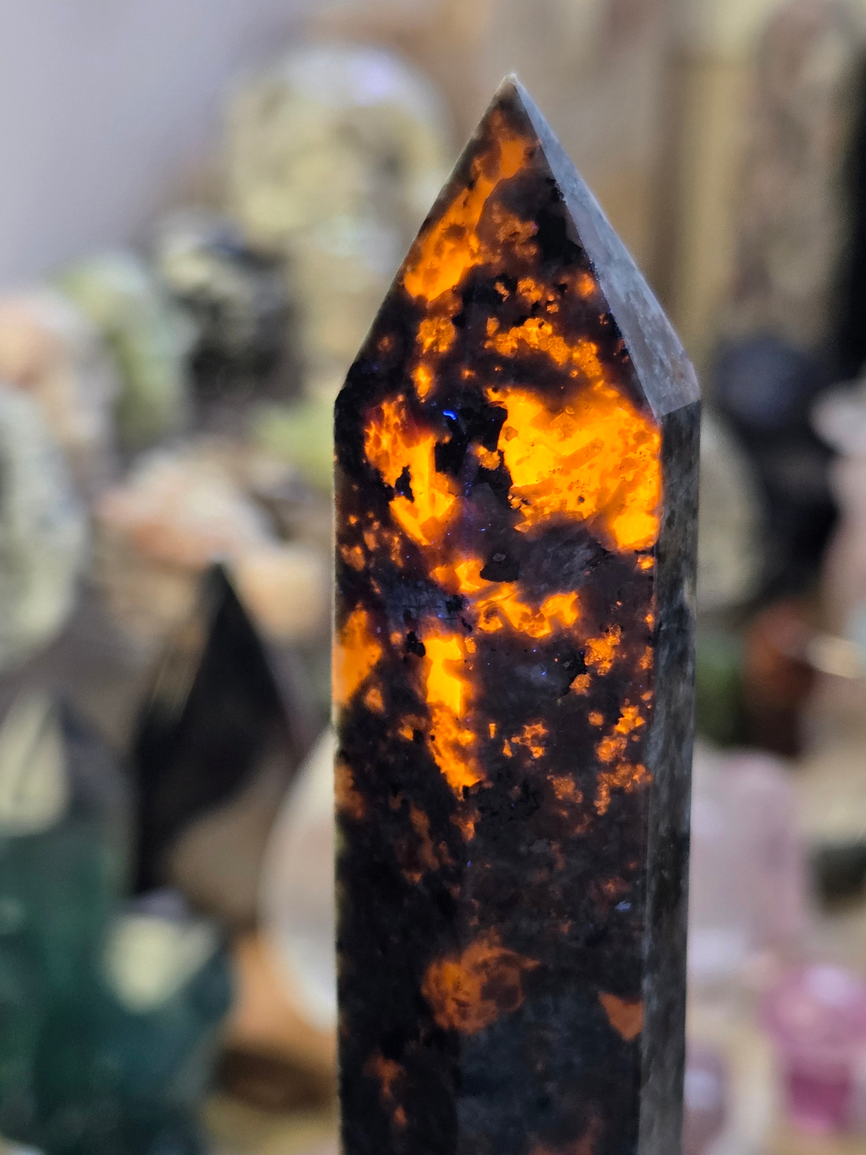 Large Yooperlite crystal tower with orange Uv