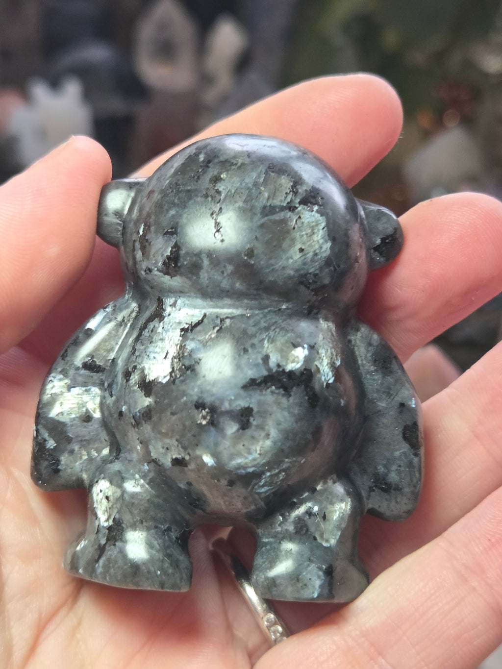 Larvakite crystal monkey carving