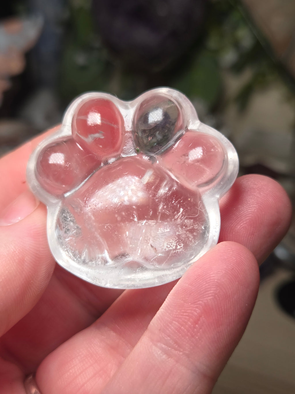 Clear quartz crystal paw print carving