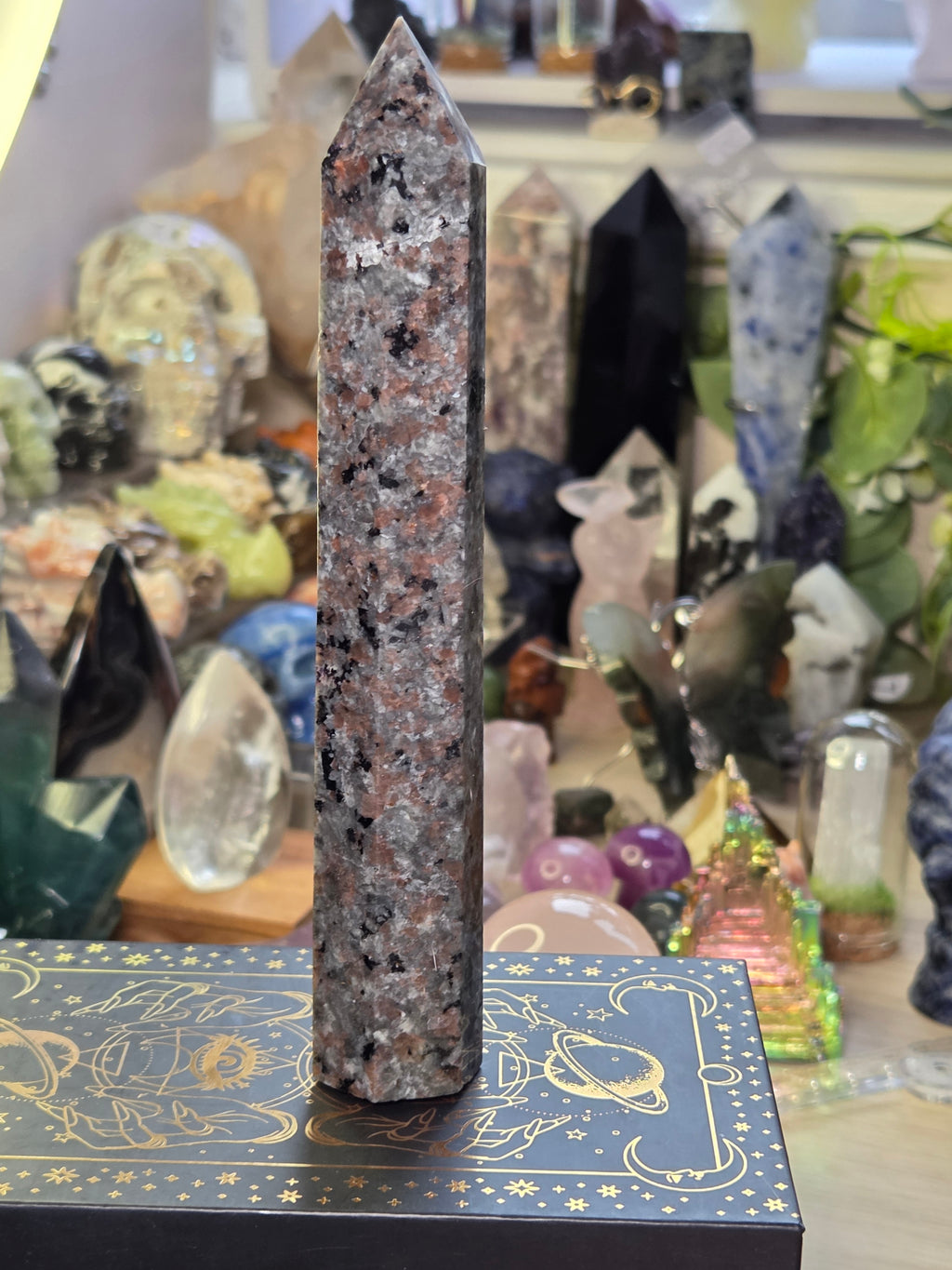 Large Yooperlite crystal tower with orange Uv