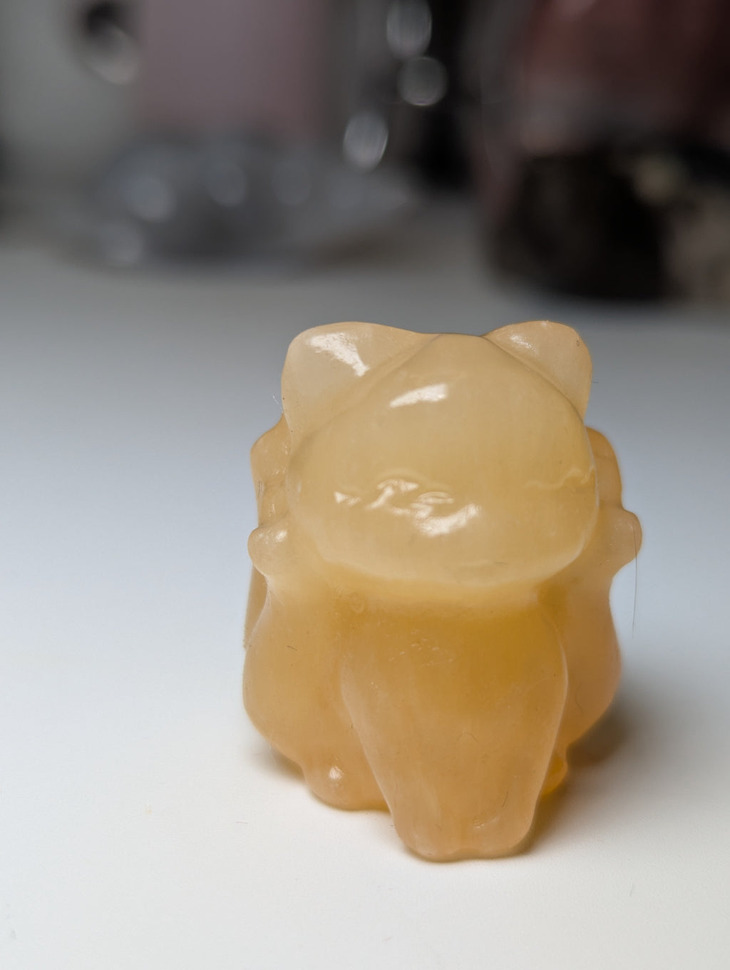 Orange calcite crystal nail tail fox
