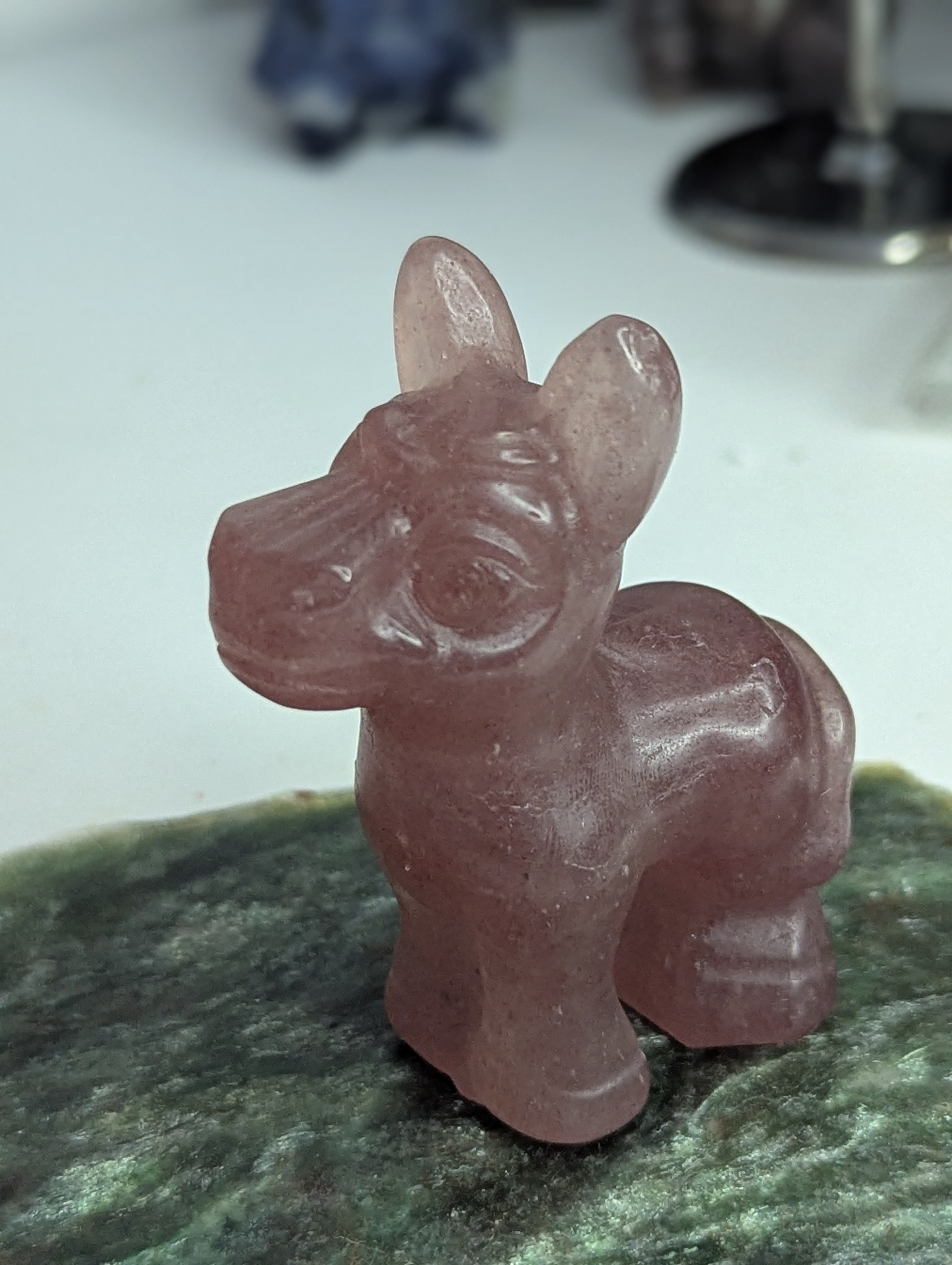 Strawberry quartz crystal donkey carving