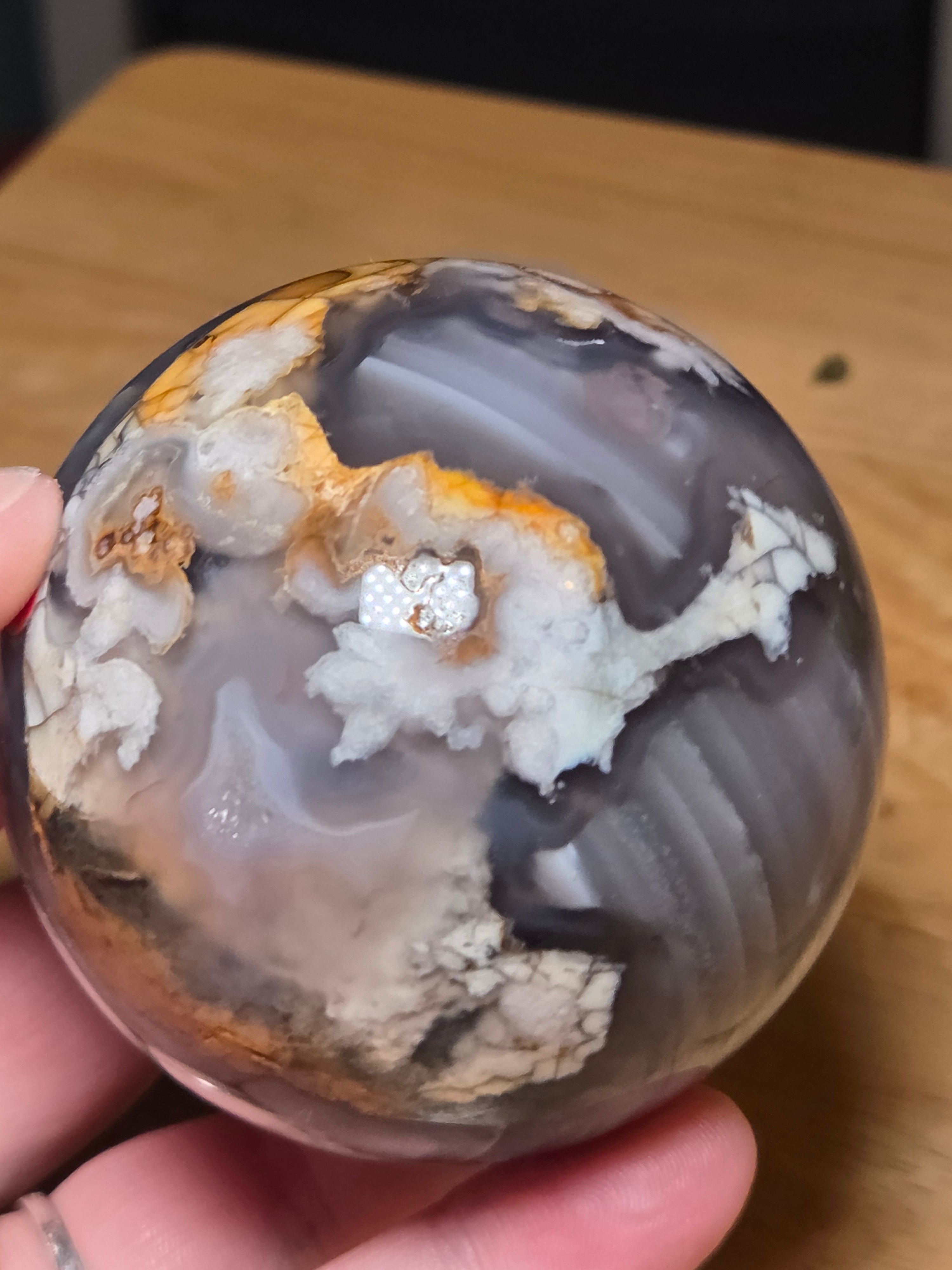 Natural black flower agate crystal sphere