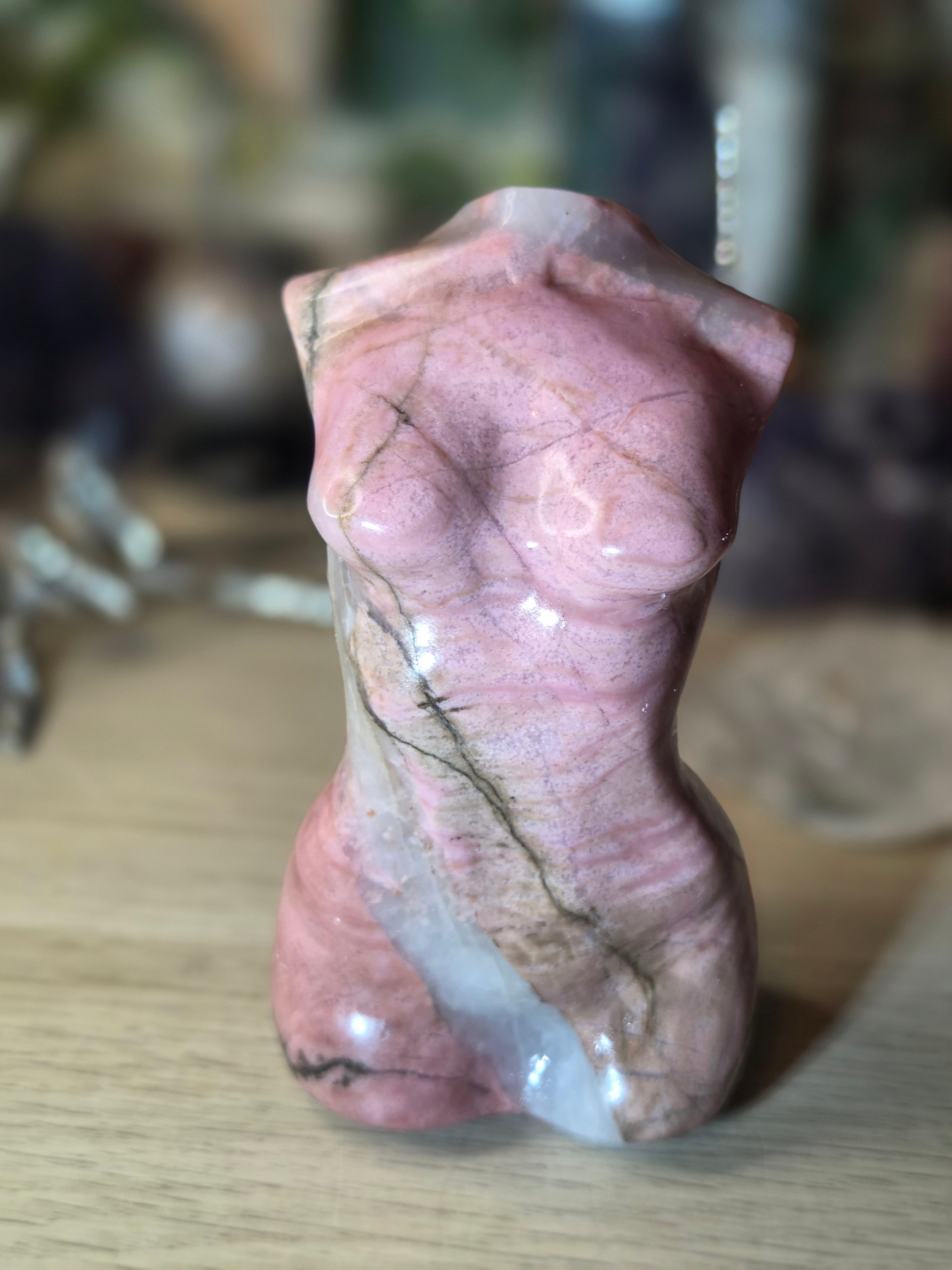 Rhodonite crystal female body carving