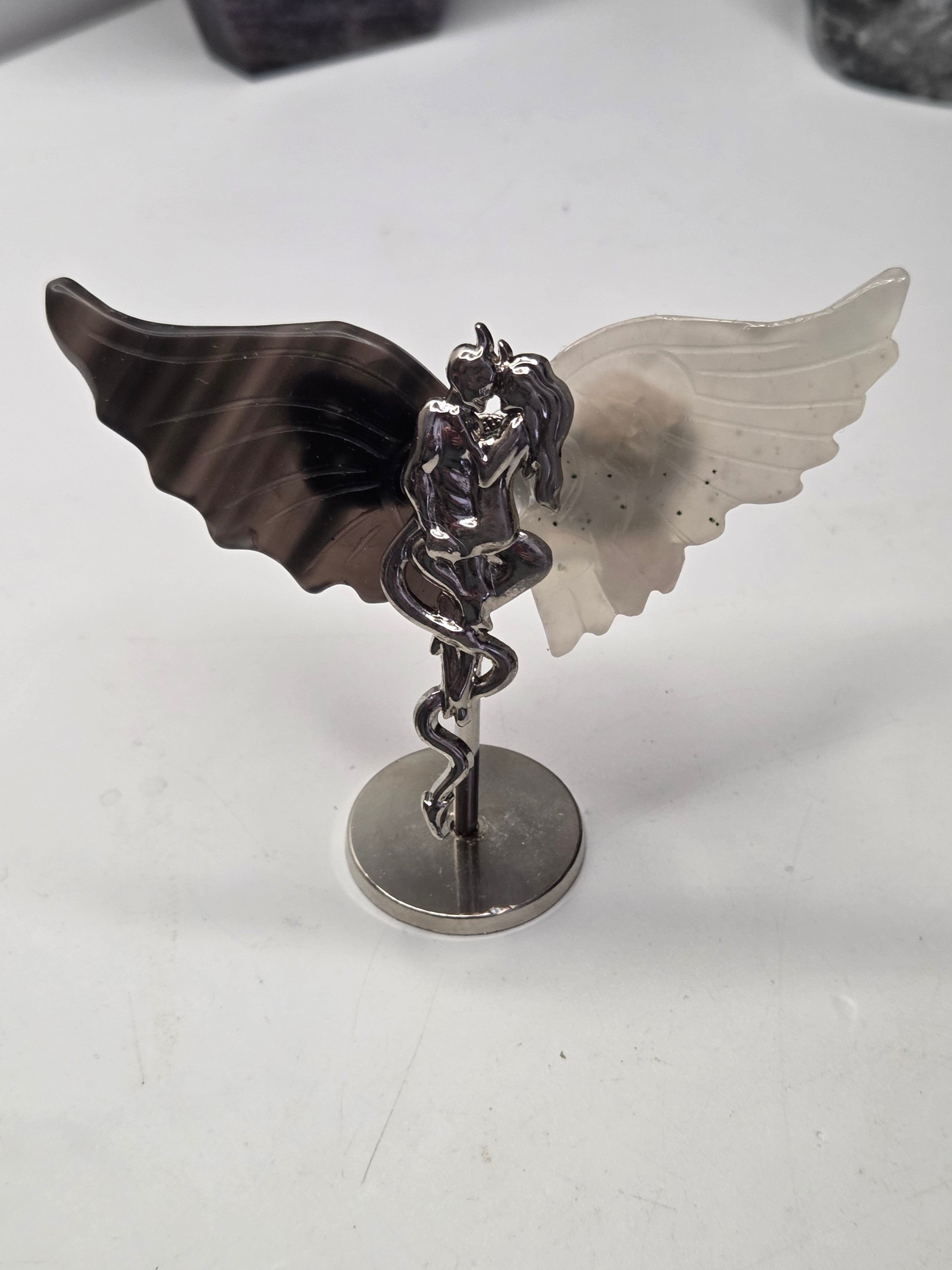 Devil and angel crystal carving