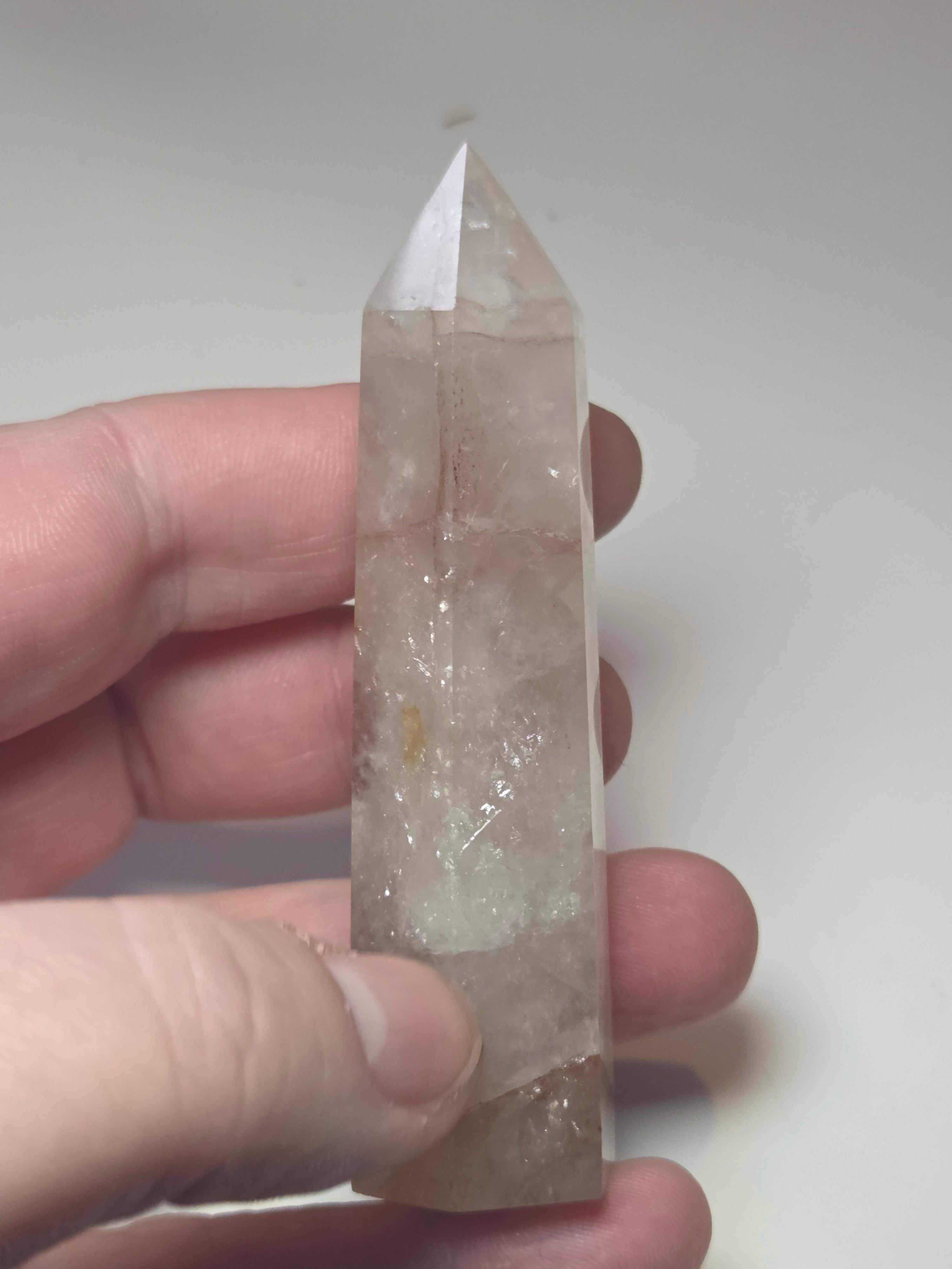 Fire quartz crystal tower carving with imperfections