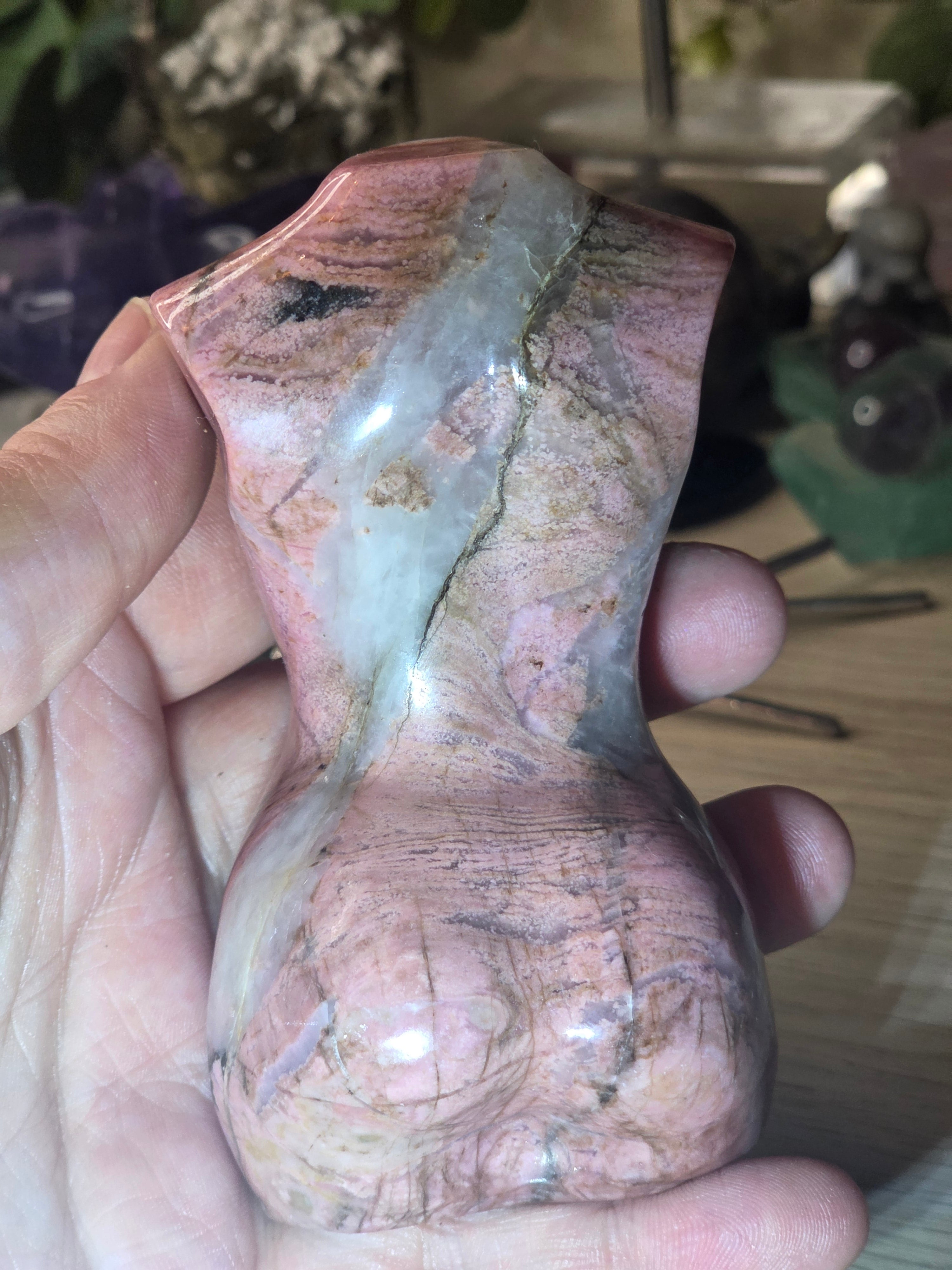 Rhodonite crystal female body carving