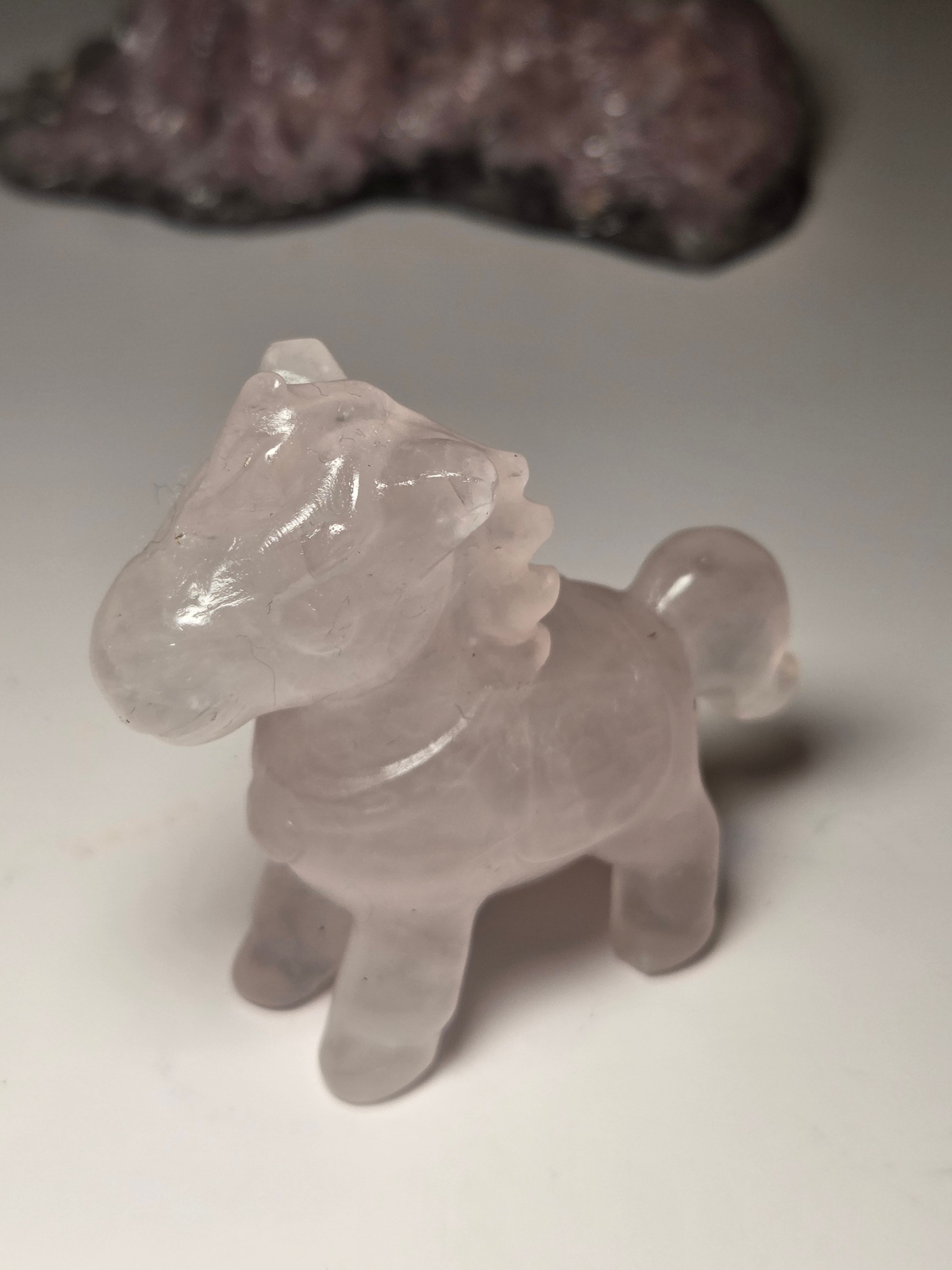 Rose quartz crystal horse carving