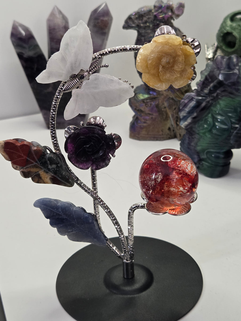 Flower and butterfly sphere stand