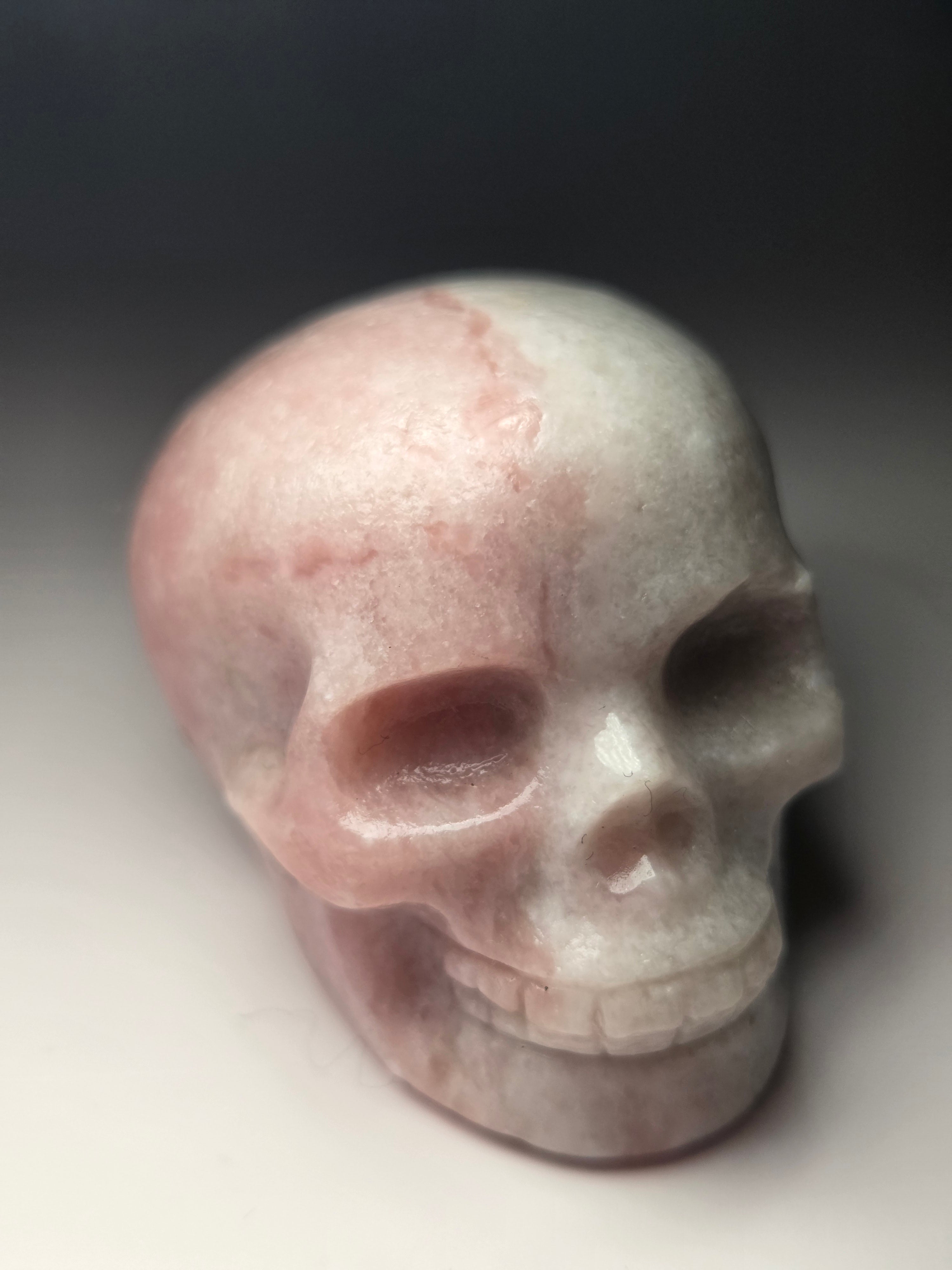 Pink opal  crystal skull carving