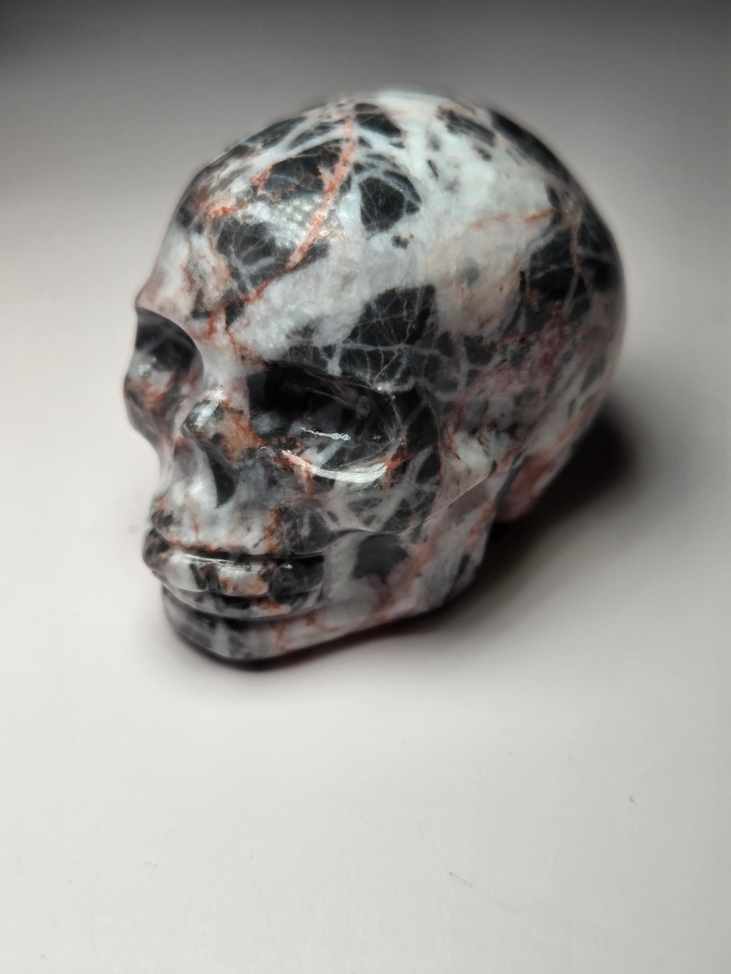 Red vain jasper crystal skull