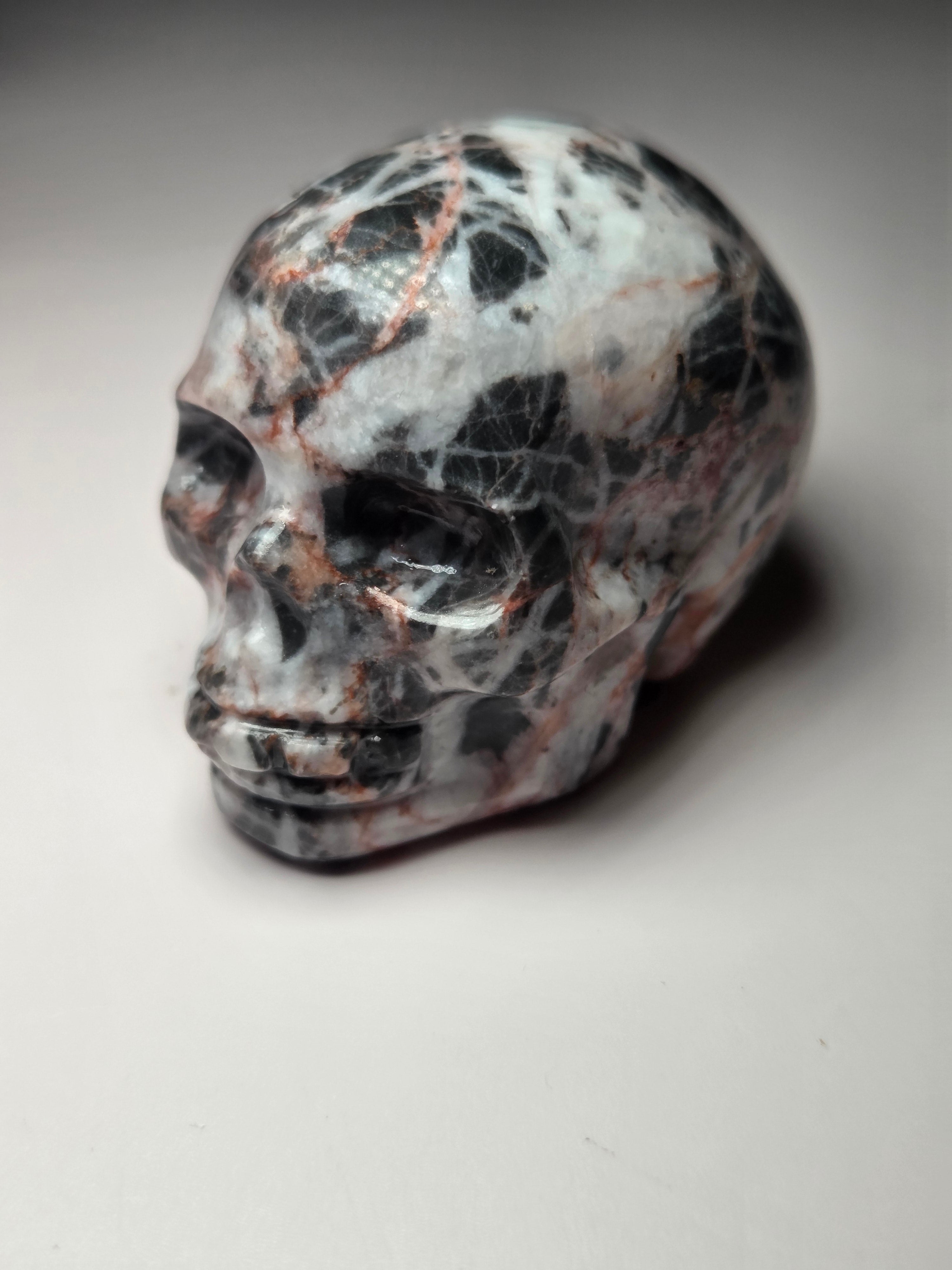 Red vain jasper crystal skull