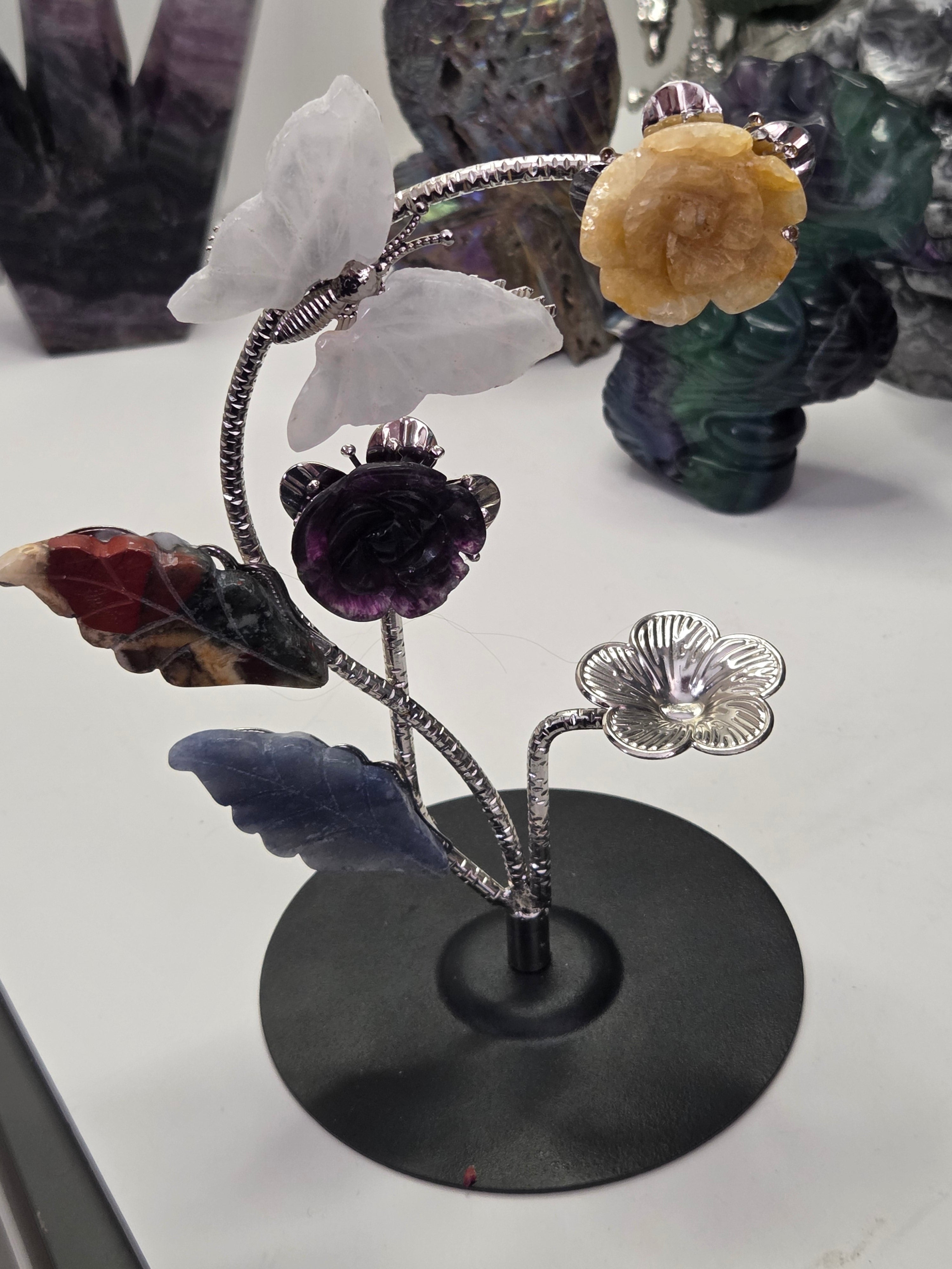 Flower and butterfly sphere stand