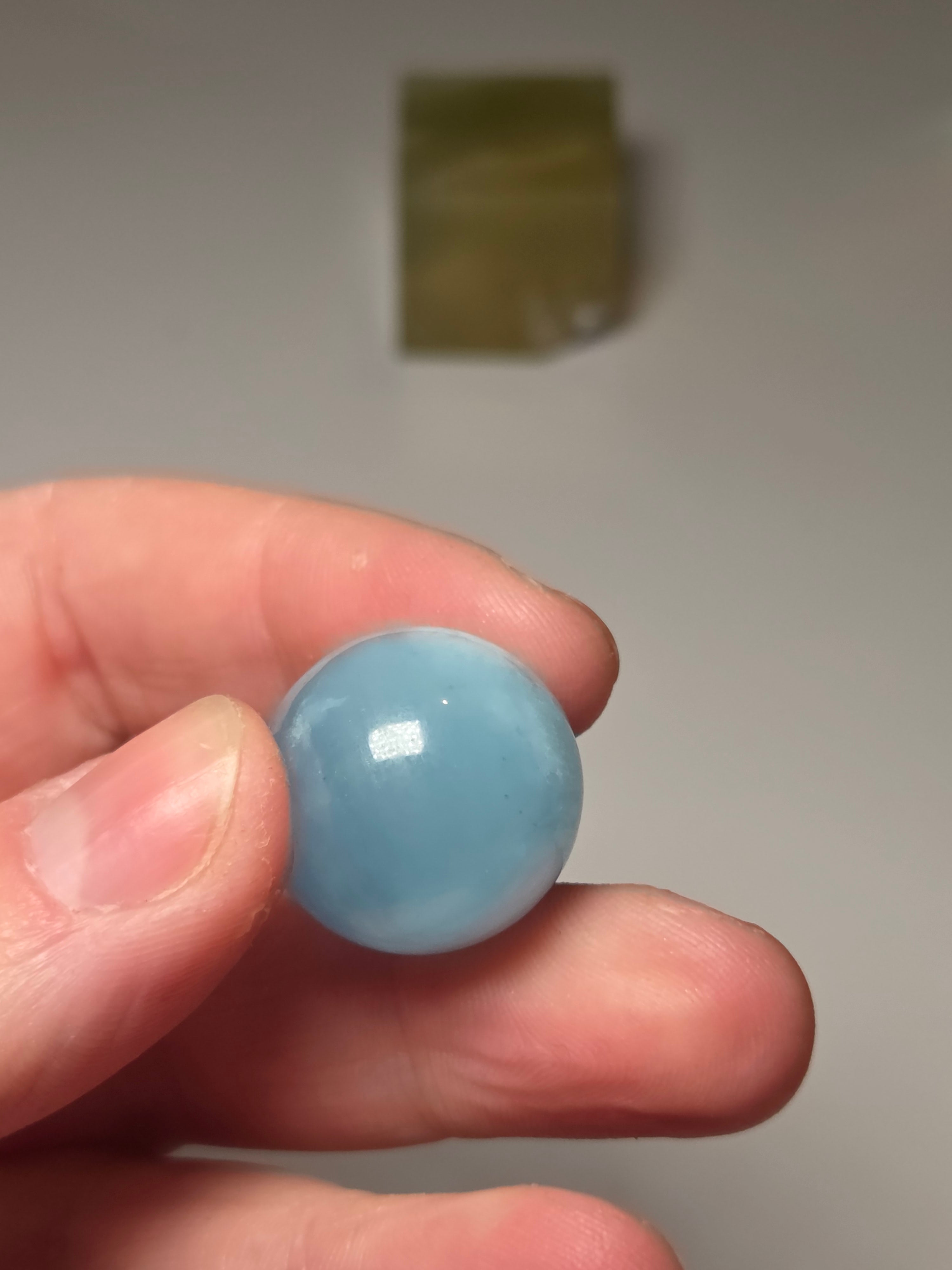 Aquamarine crystal sphere with stand