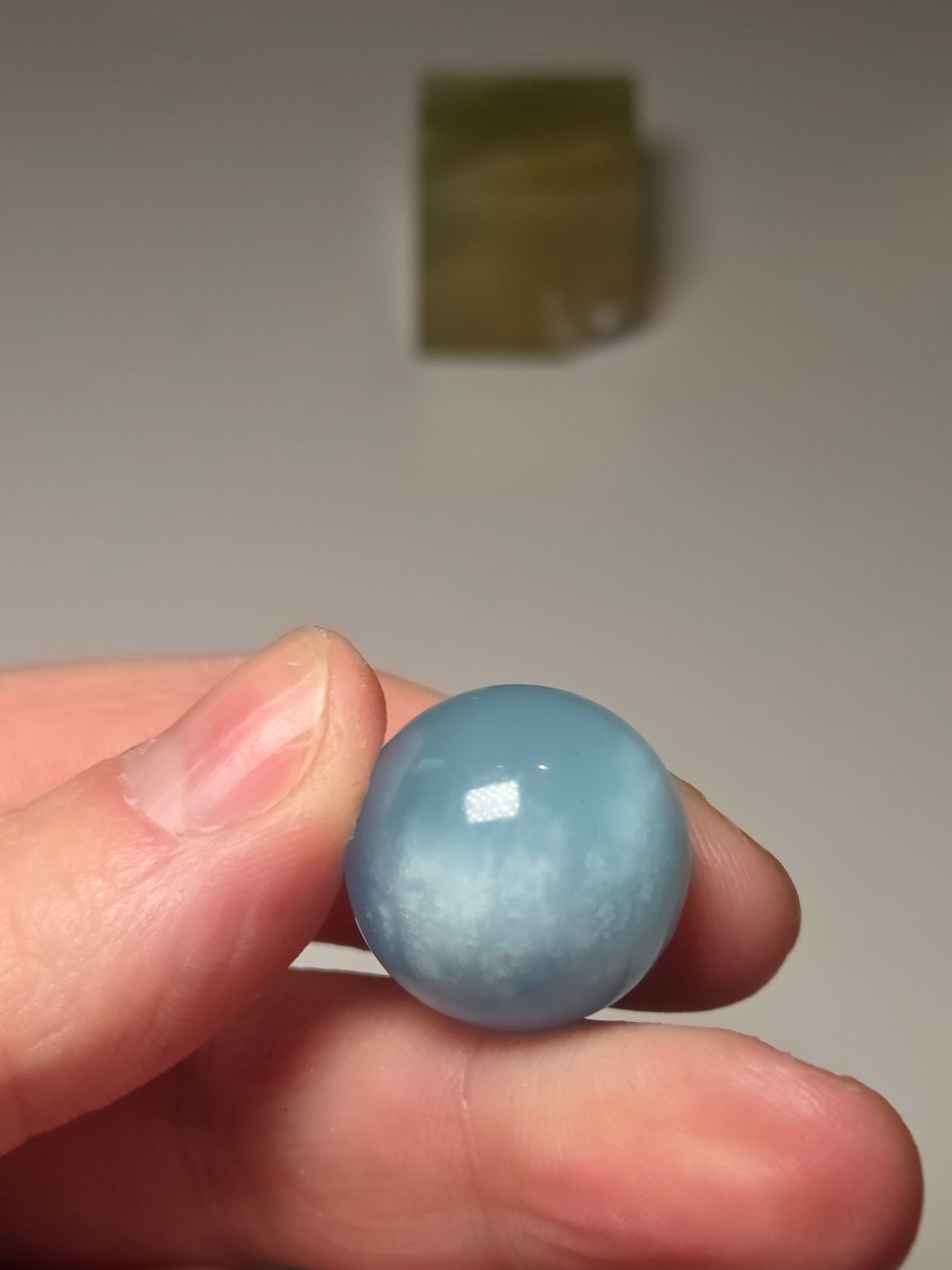 Aquamarine crystal sphere with stand