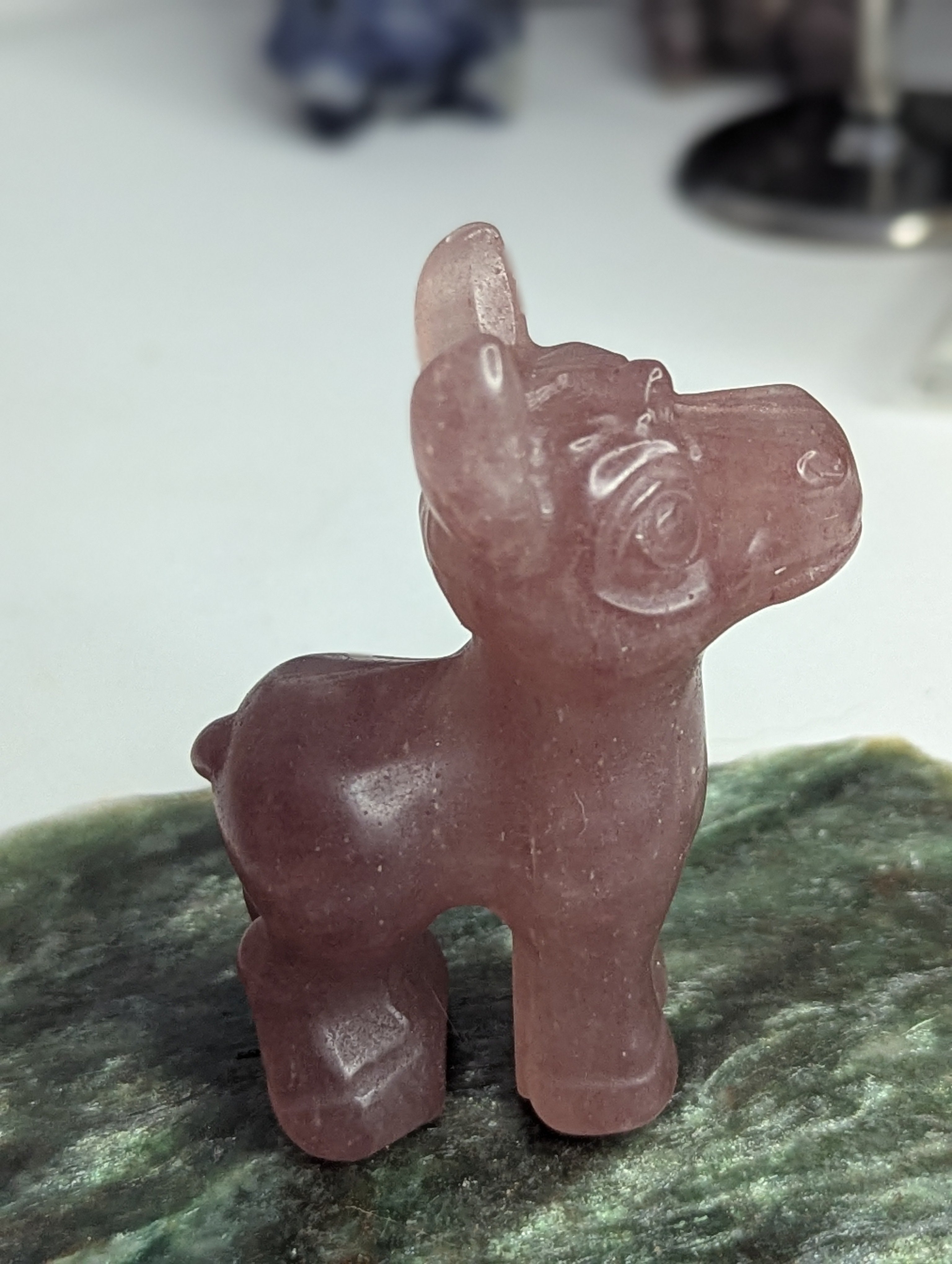 Strawberry quartz crystal donkey carving